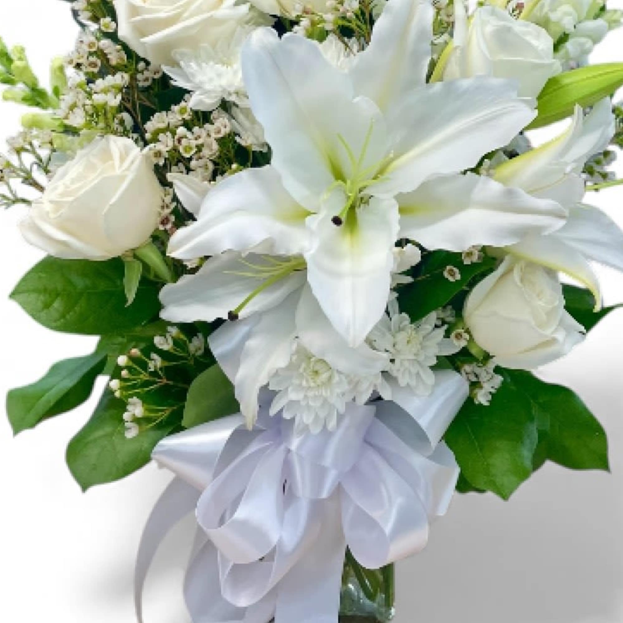 White lily and rose bouquet with a white ribbon