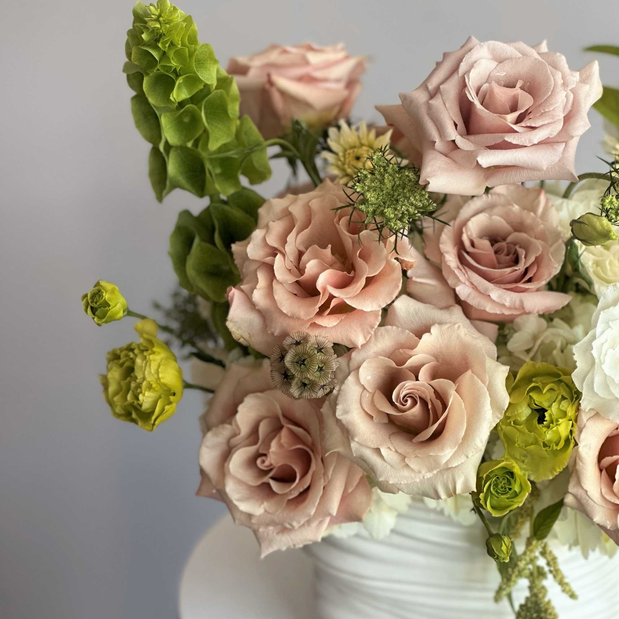This soft and elegant arrangement features blush pink roses, creamy white blooms, photo 2 of 2