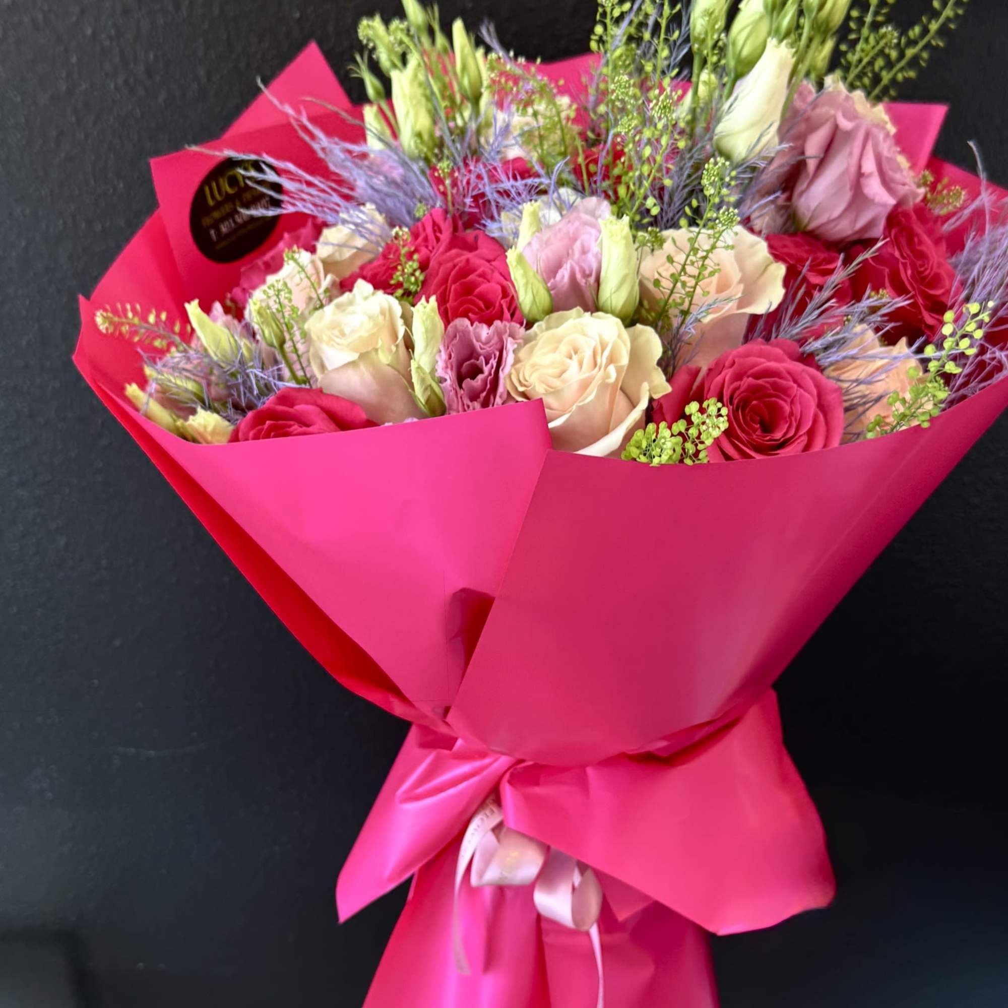 A custom-wrapped bouquet featuring two stunning shades of pink roses &mdash; soft, photo 2 of 2