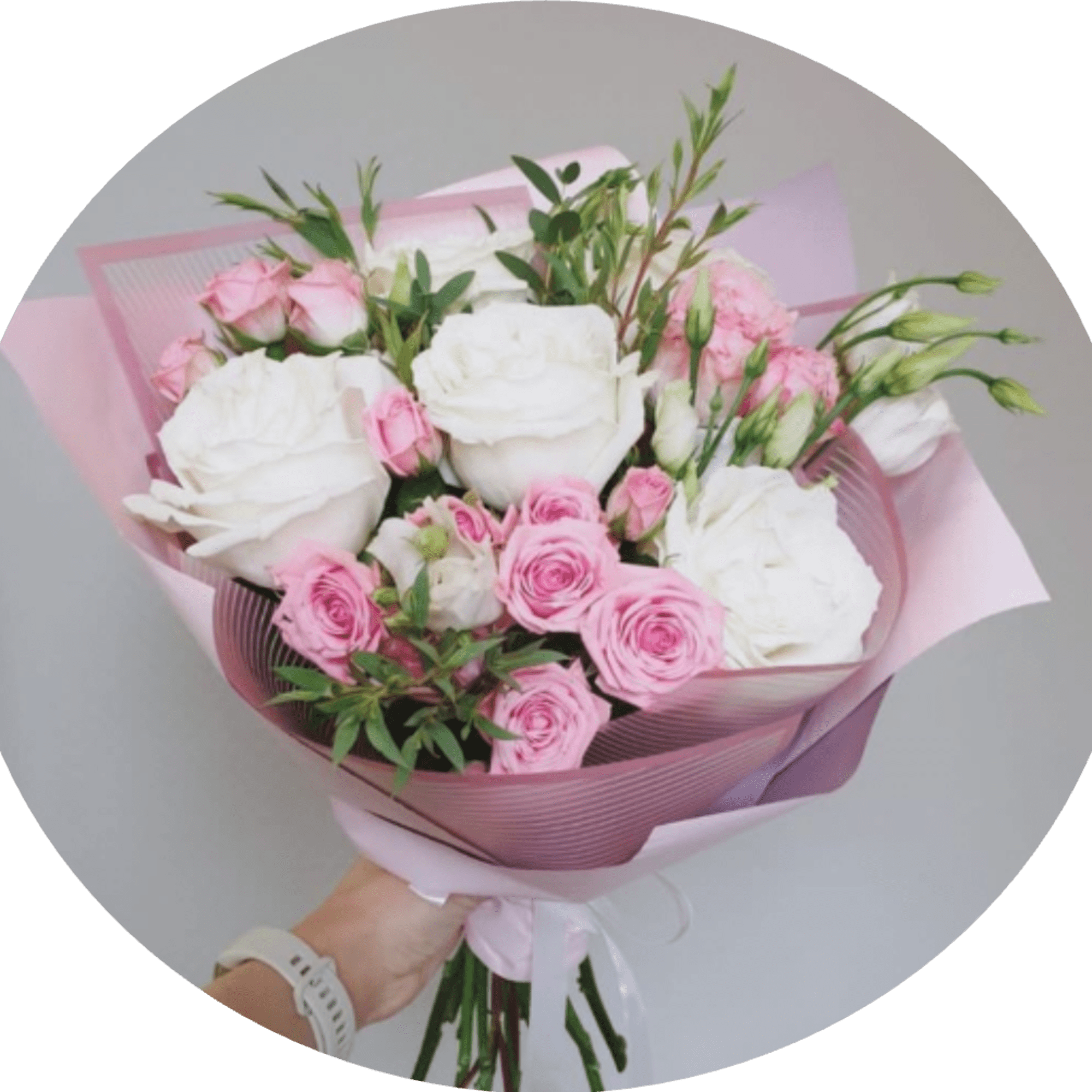A lush cluster of large white roses paired with soft pink roses