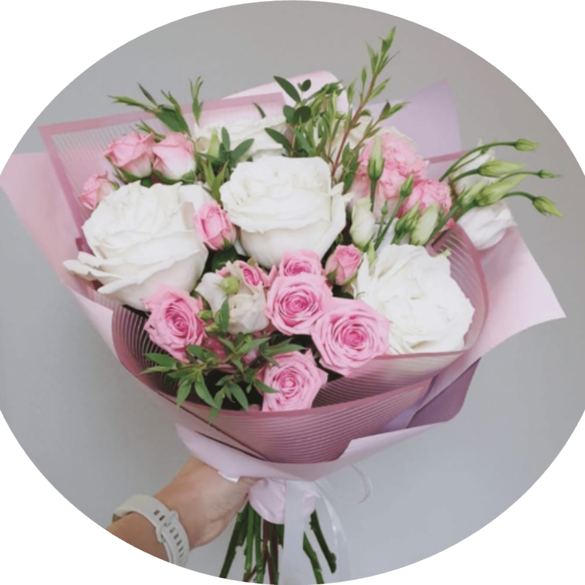 A lush cluster of large white roses paired with soft pink roses