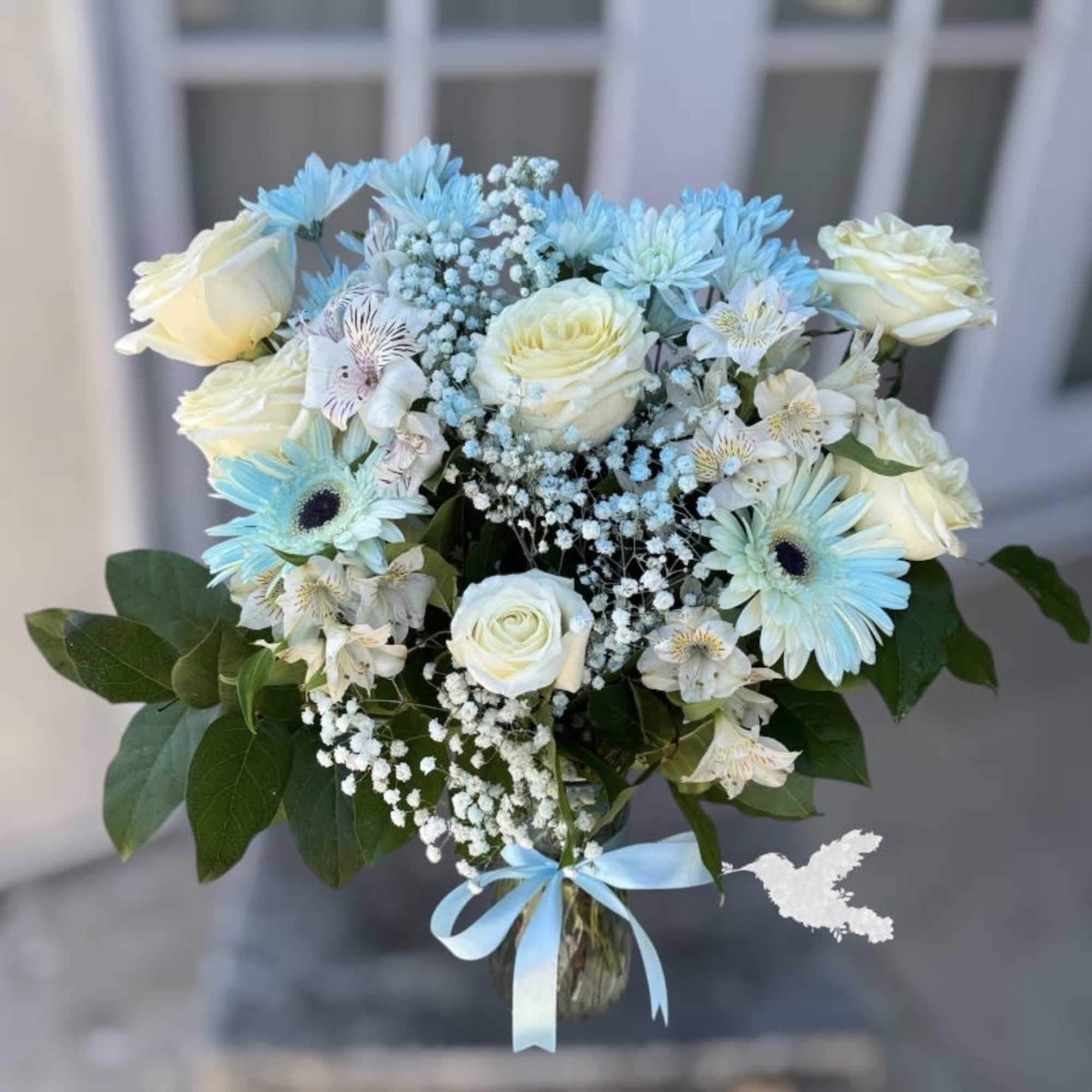 Delight your recipient with Orchids Little Secret Boutique Brilliant beige white roses
