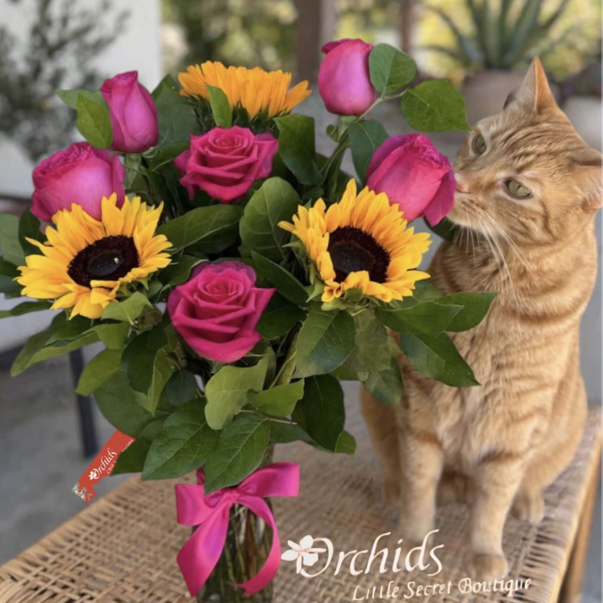 Brighten someone's day with the cheerful beauty of our Sunflower &amp; Fuchsia