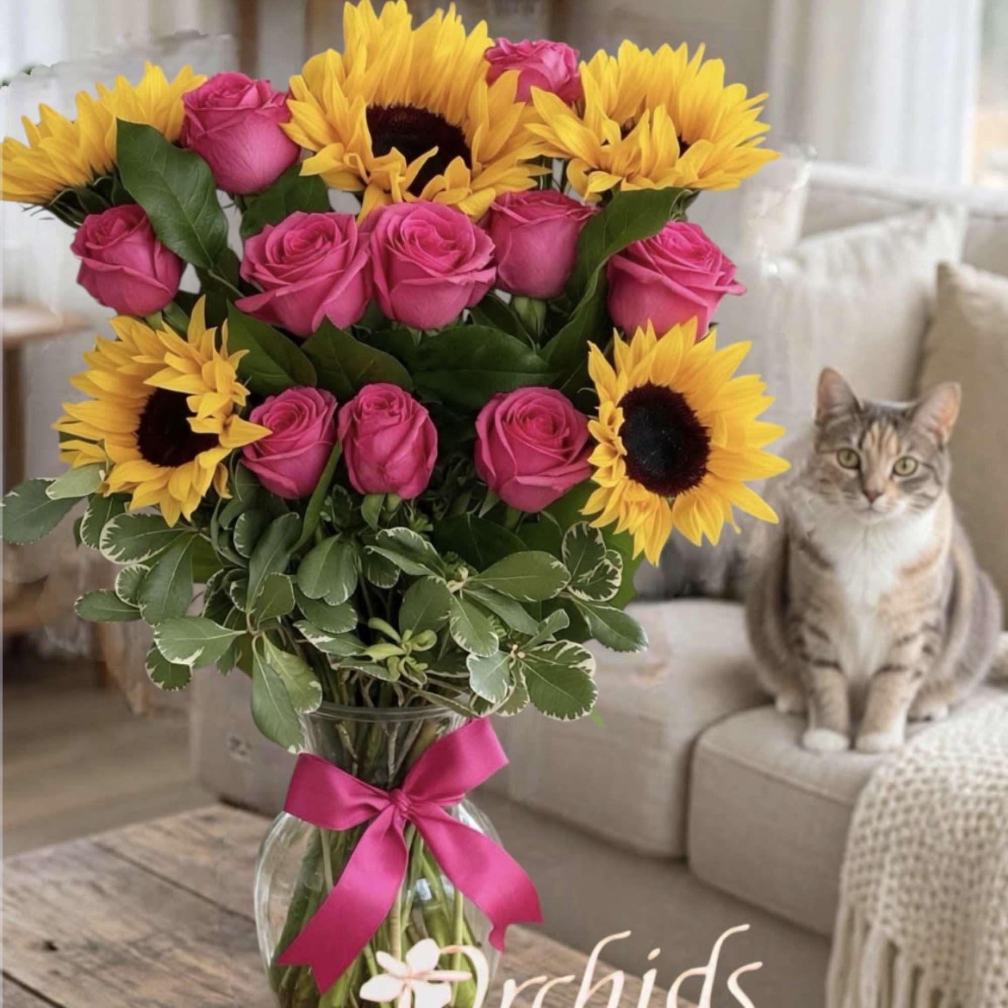 Brighten someone's day with the cheerful beauty of our Sunflower &amp; Fuchsia