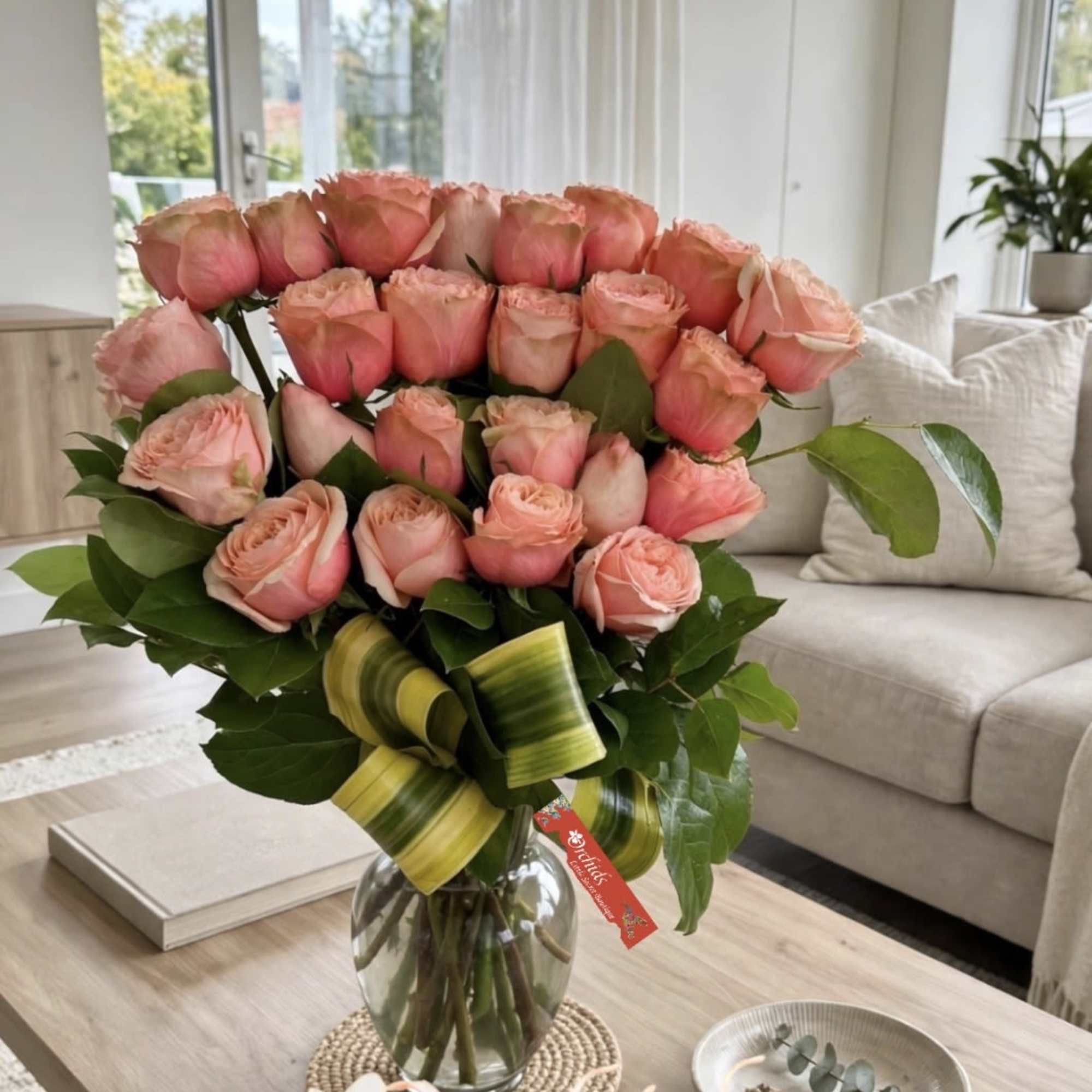 Arrangement measures approximately 19"H
Experience the beauty of premium Peach Kahala Garden Roses