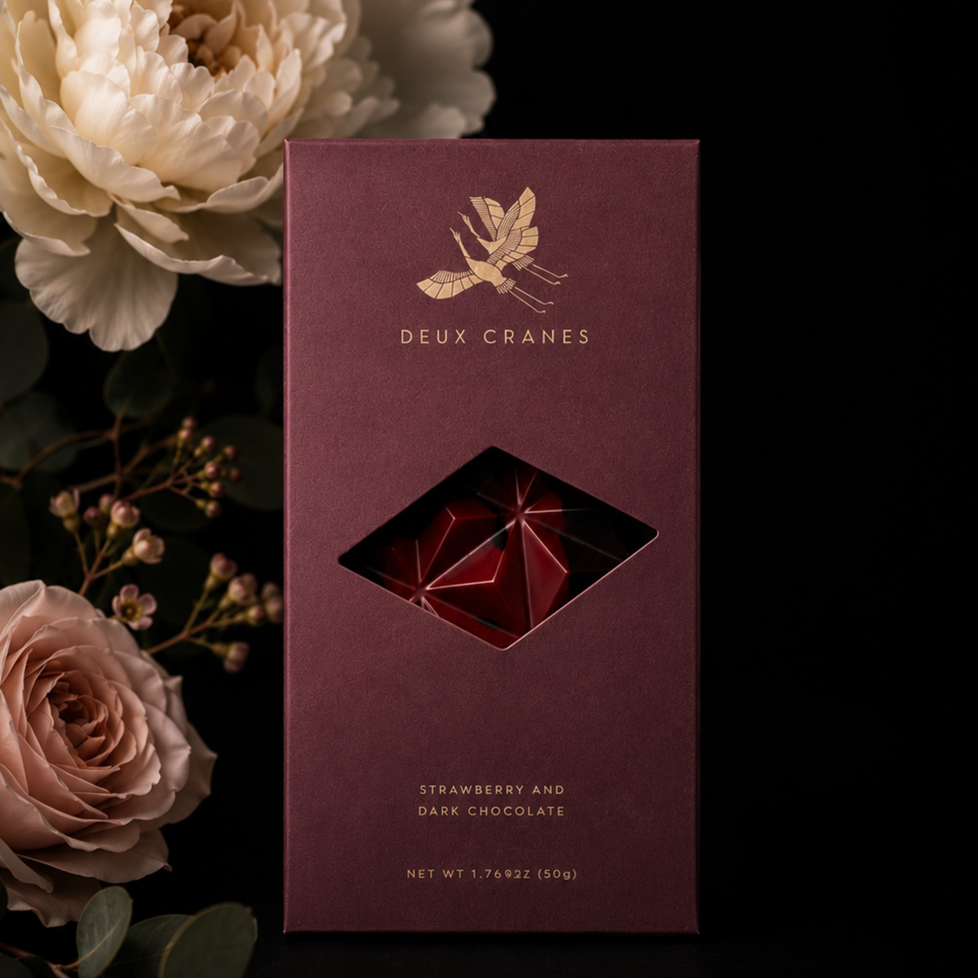A bold yet romantic classic with a modern twist.
Rich, velvety dark chocolate
