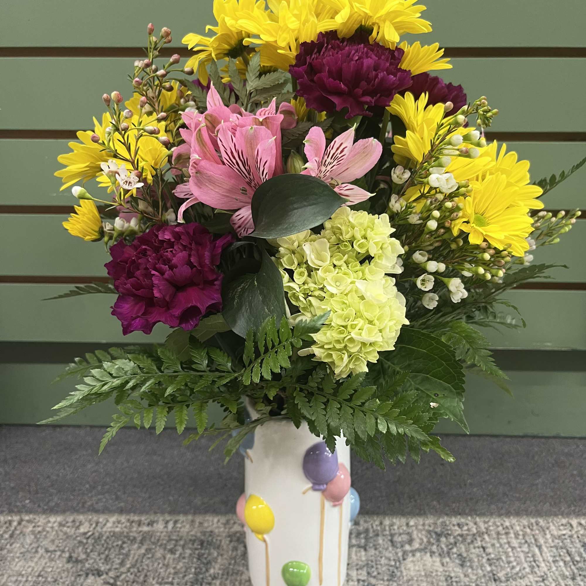 Bright, confetti-like color greets them the moment this bouquet arrives. As a