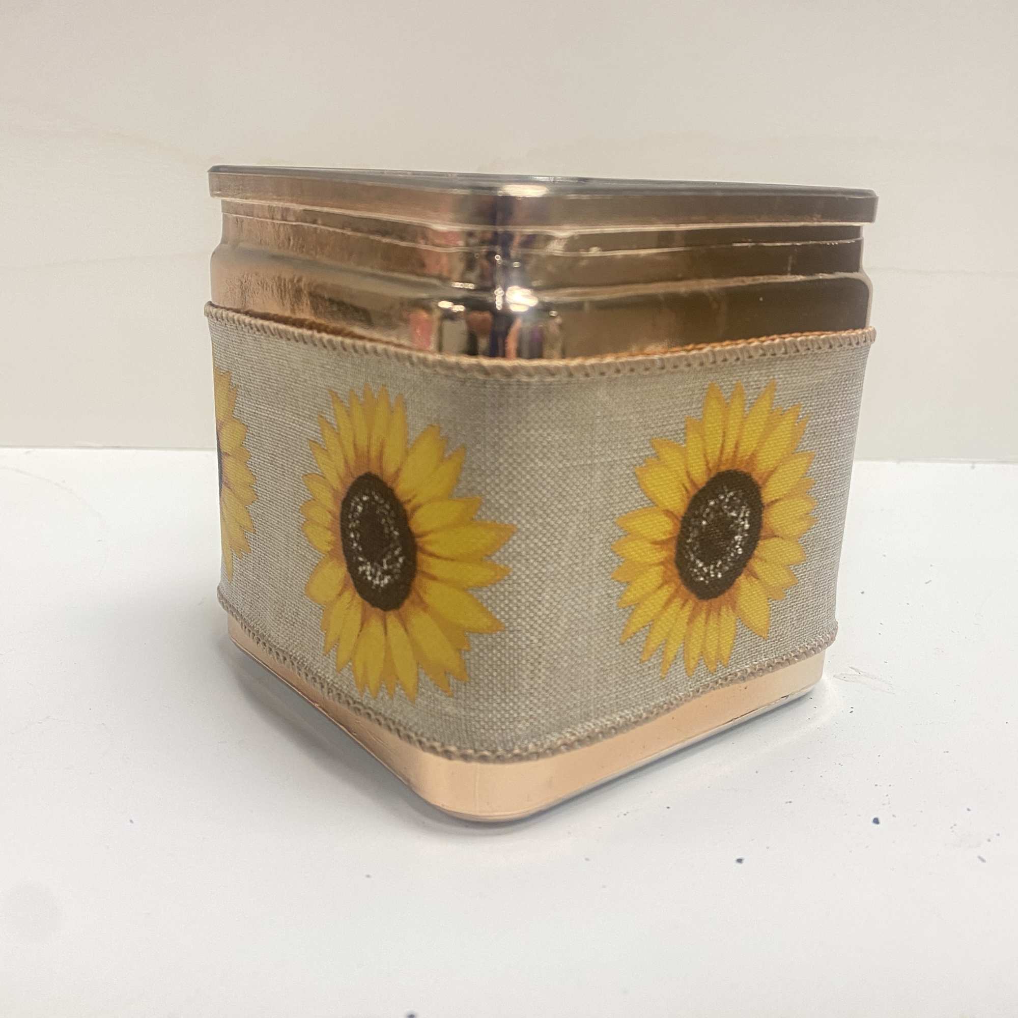 Square metal tin with sunflower print and burlap wrap