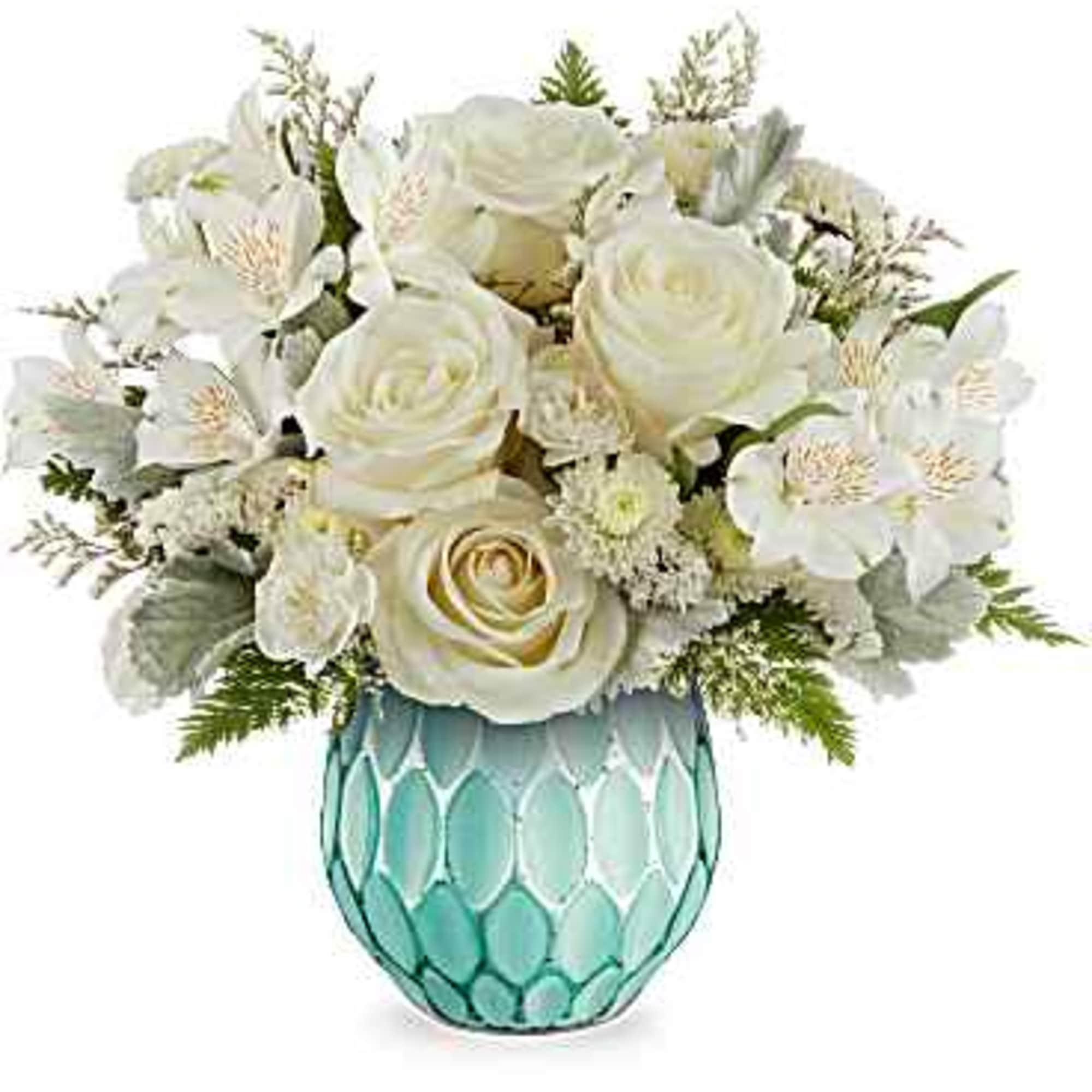 White roses and alstroemeria in a turquoise glass vase
