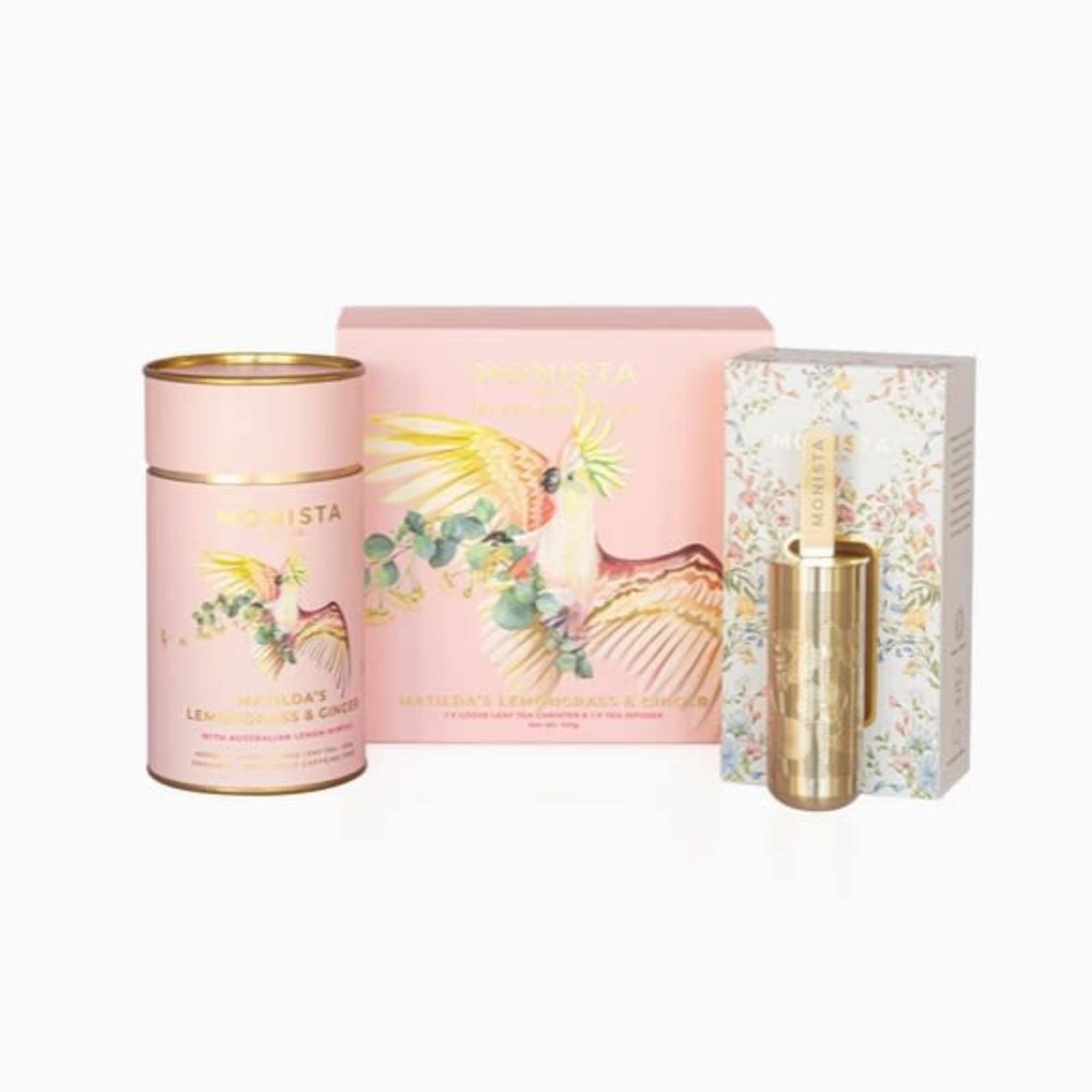 Pink gift set with a candle tin, box, and gold tube packaging
