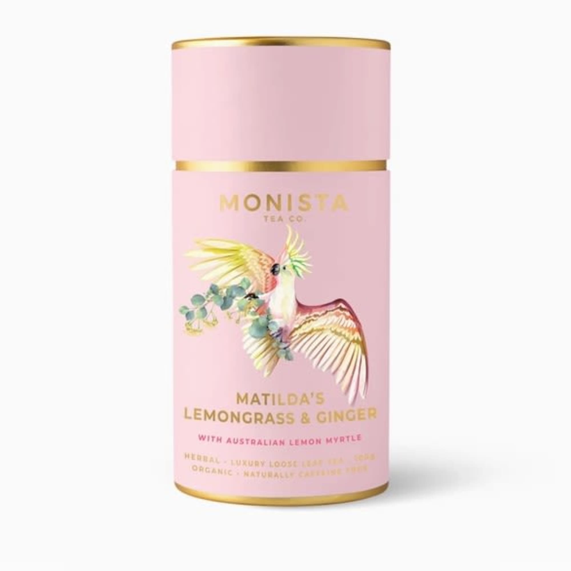 Pink tea tin with a bird illustration and gold trim