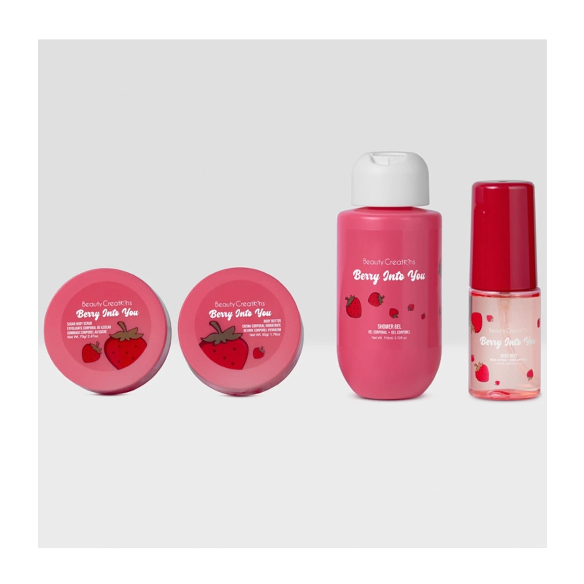 Pink berry-scented body care set with jars and bottles