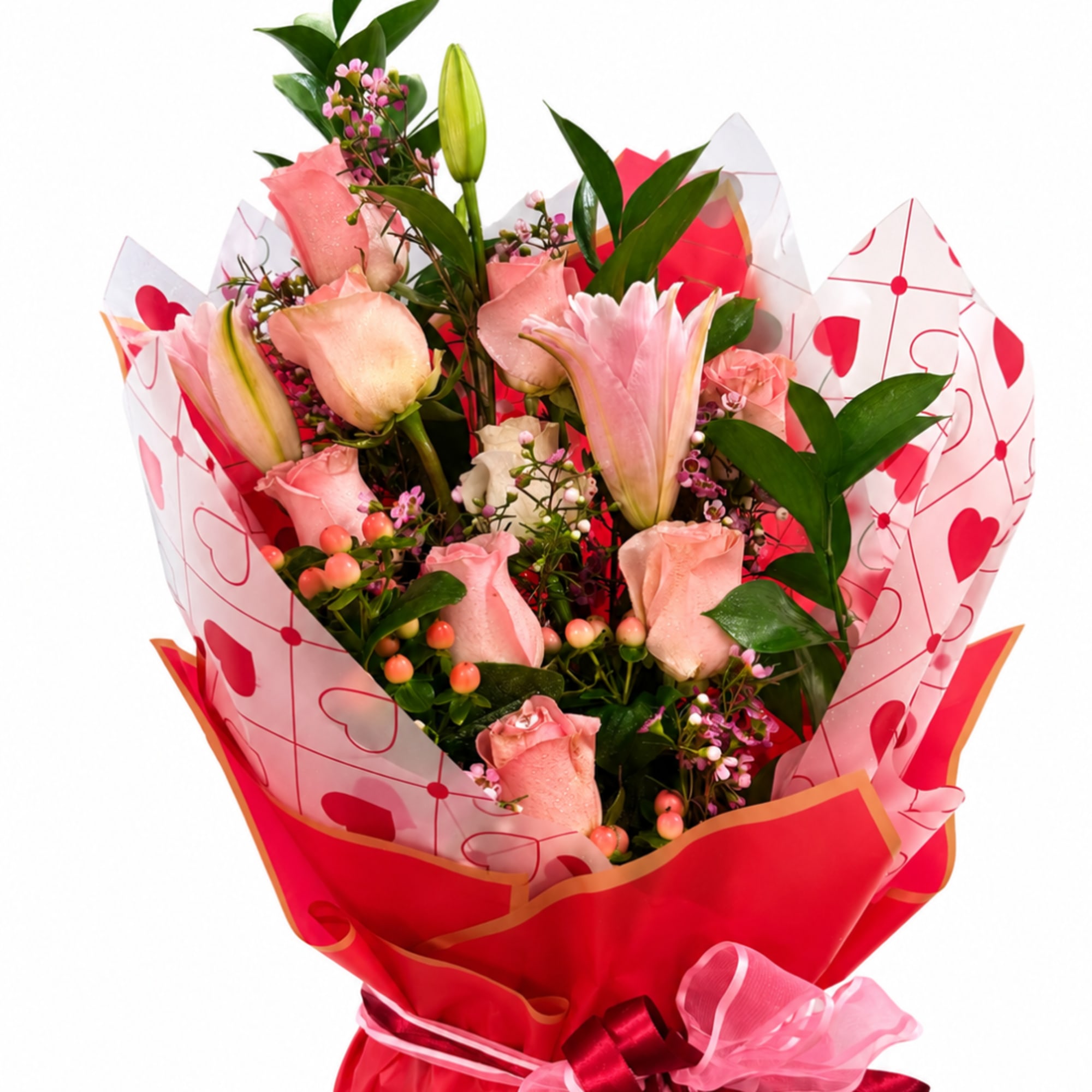 Pink roses and lilies in red heart-patterned wrapping