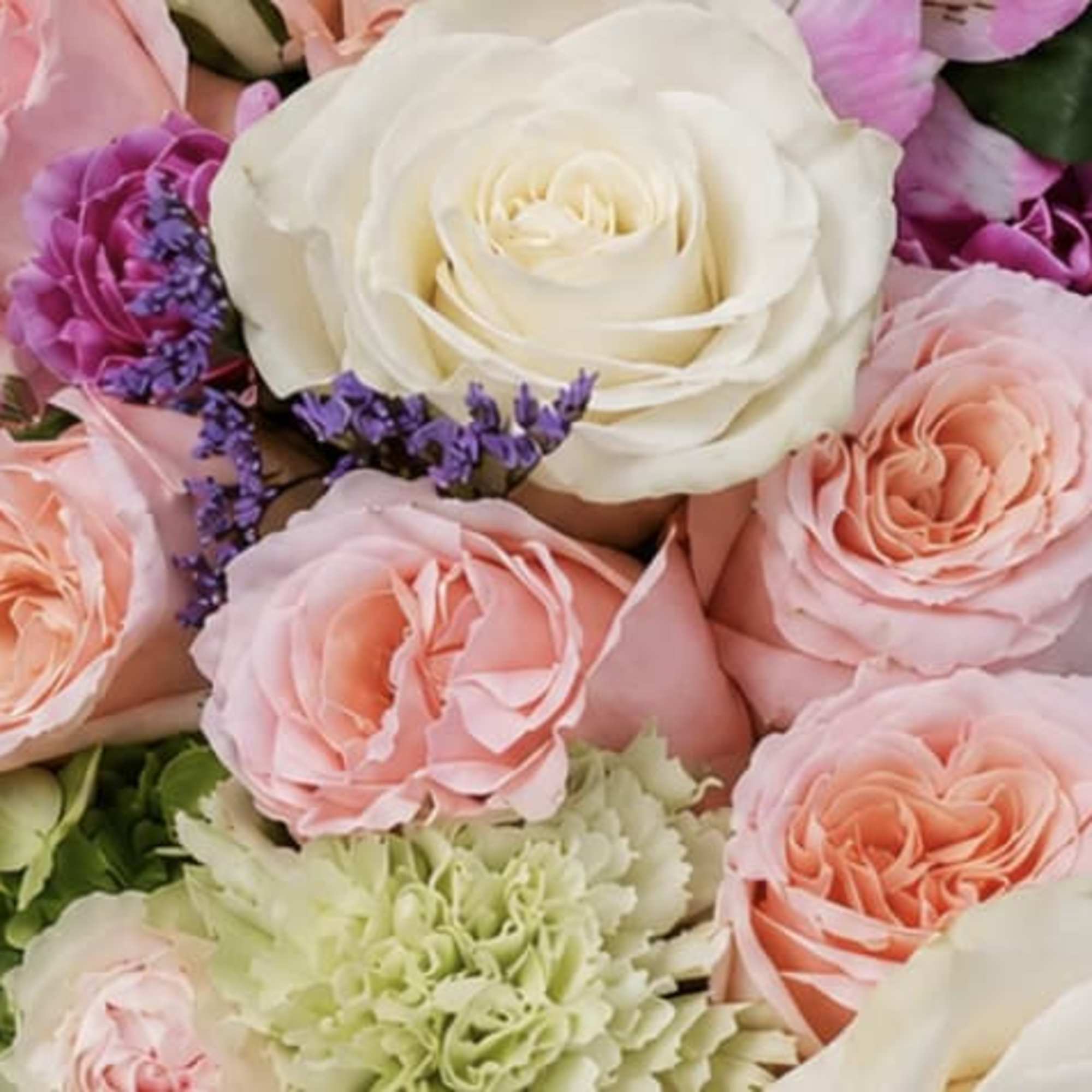 A luxurious floral arrangement designed to celebrate life&rsquo;s sweetest moments. Featuring premium, photo 3 of 4