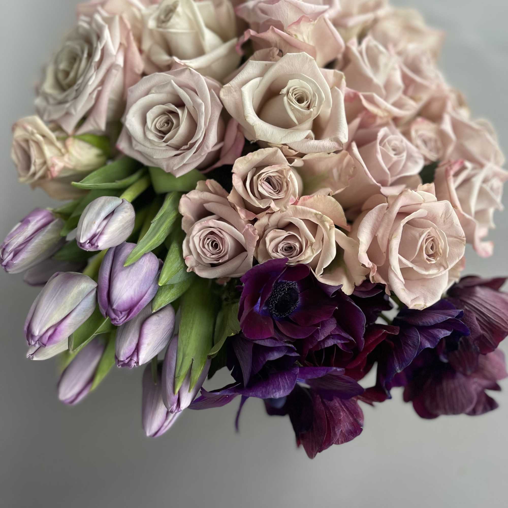 3 dozen roses, 10 stems of anemones and 10 tulips in a
