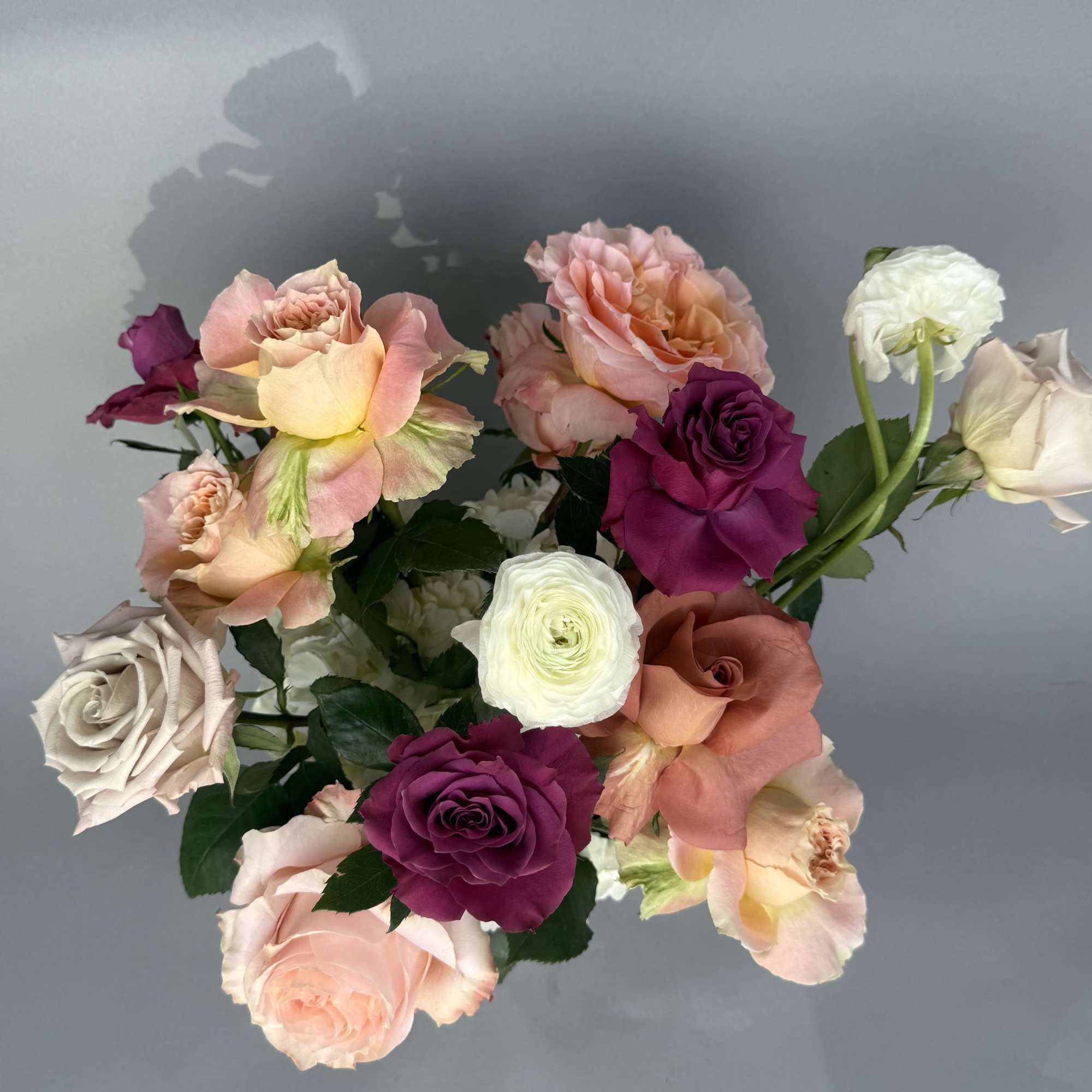 A loose, garden-style arrangement that reads like a handpicked bouquet - this, photo 2 of 2