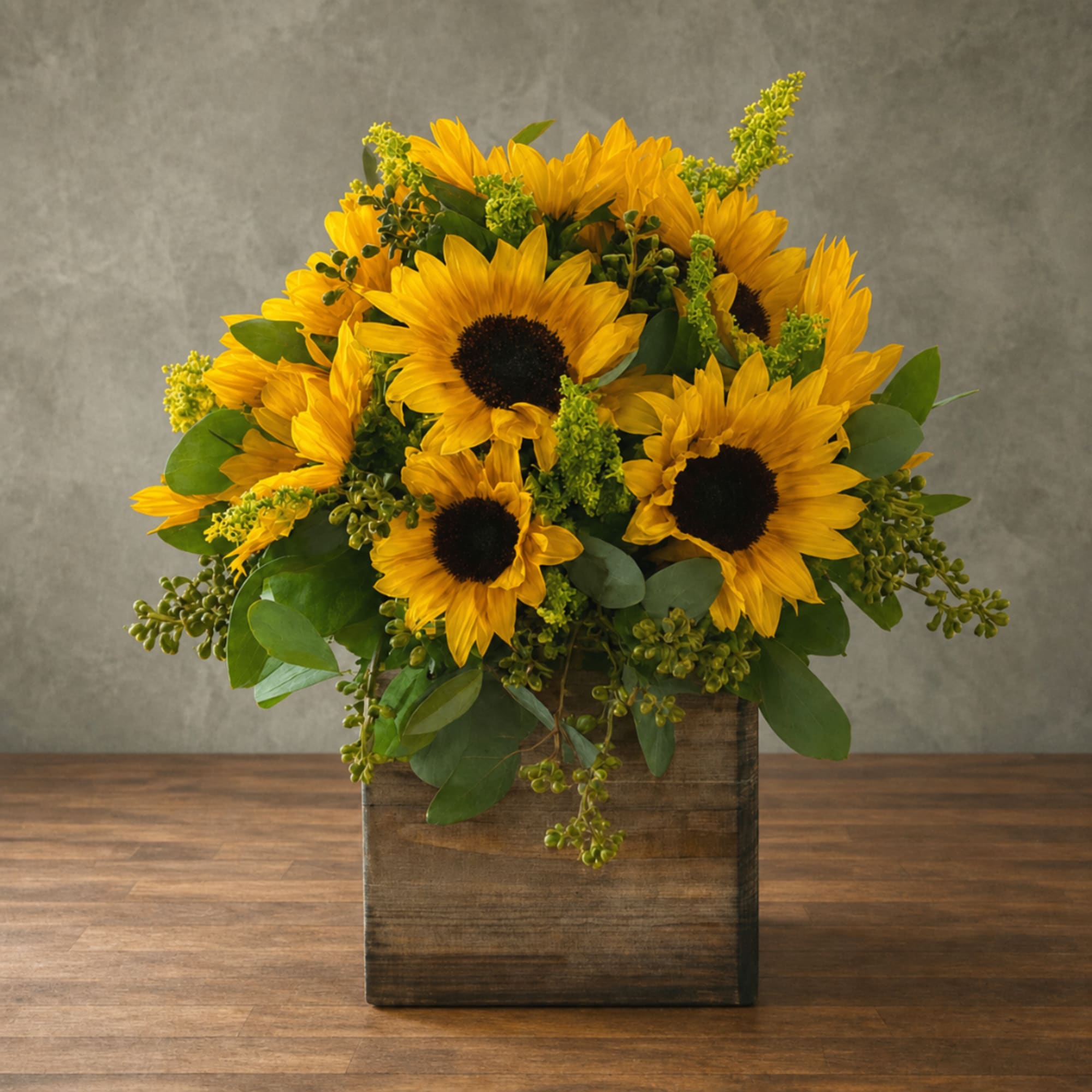 Sunflower arrangement in a rustic wooden box