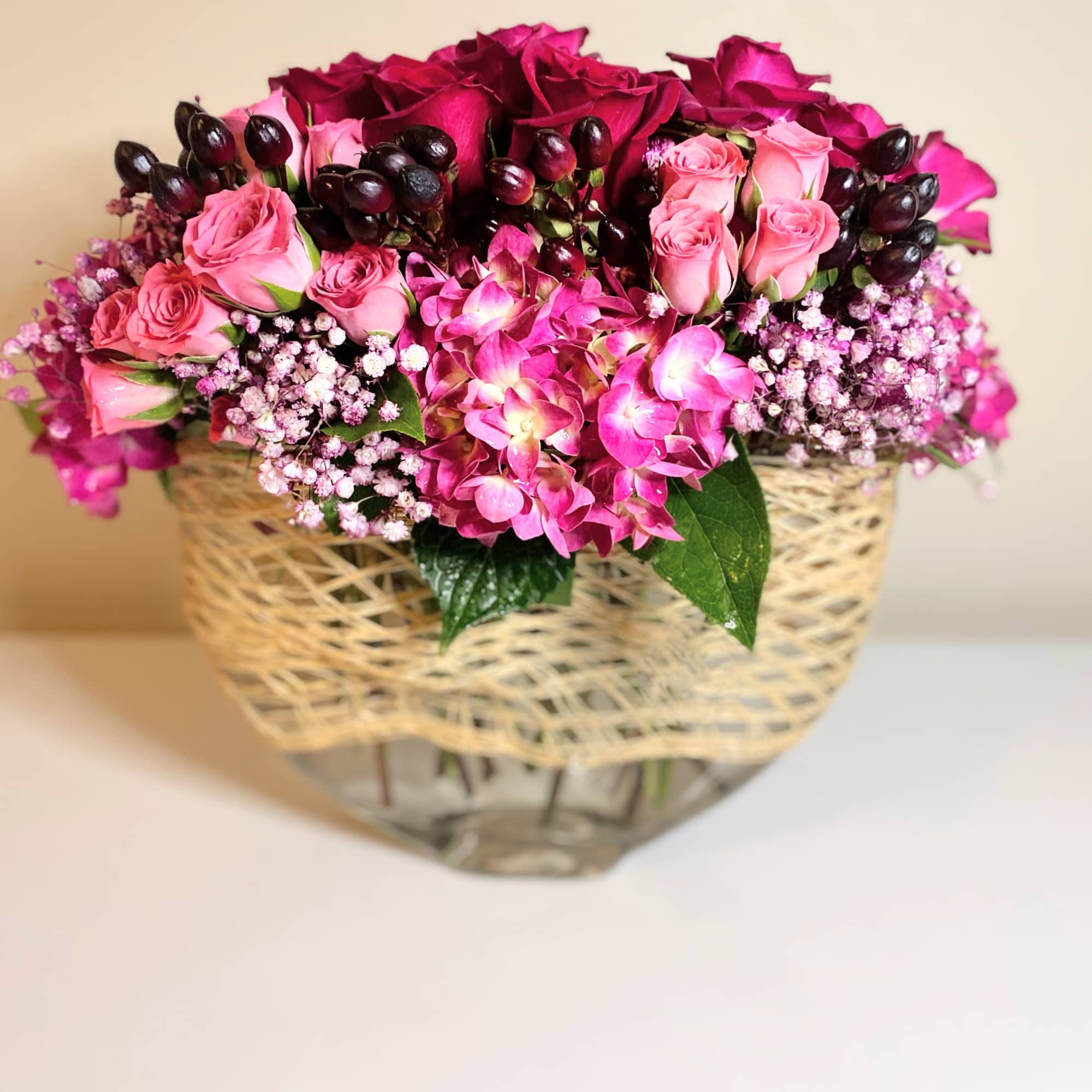 The heart throb is a lush stylized floral arrangement with mixture of