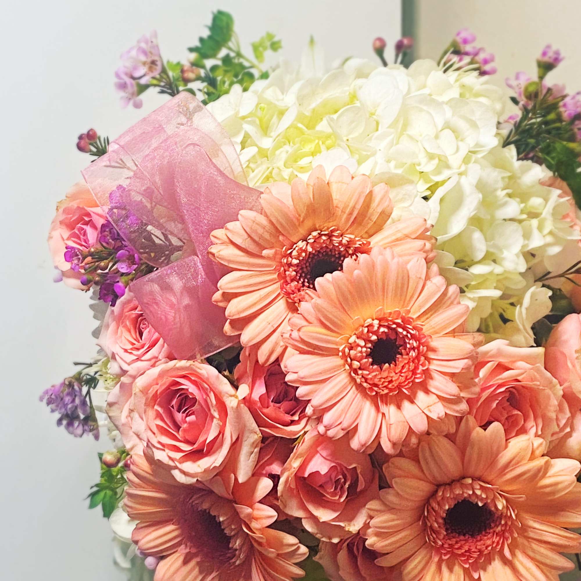 Baby girl is a sweet collection of white hydrangea, pink gerber daisies, photo 2 of 2