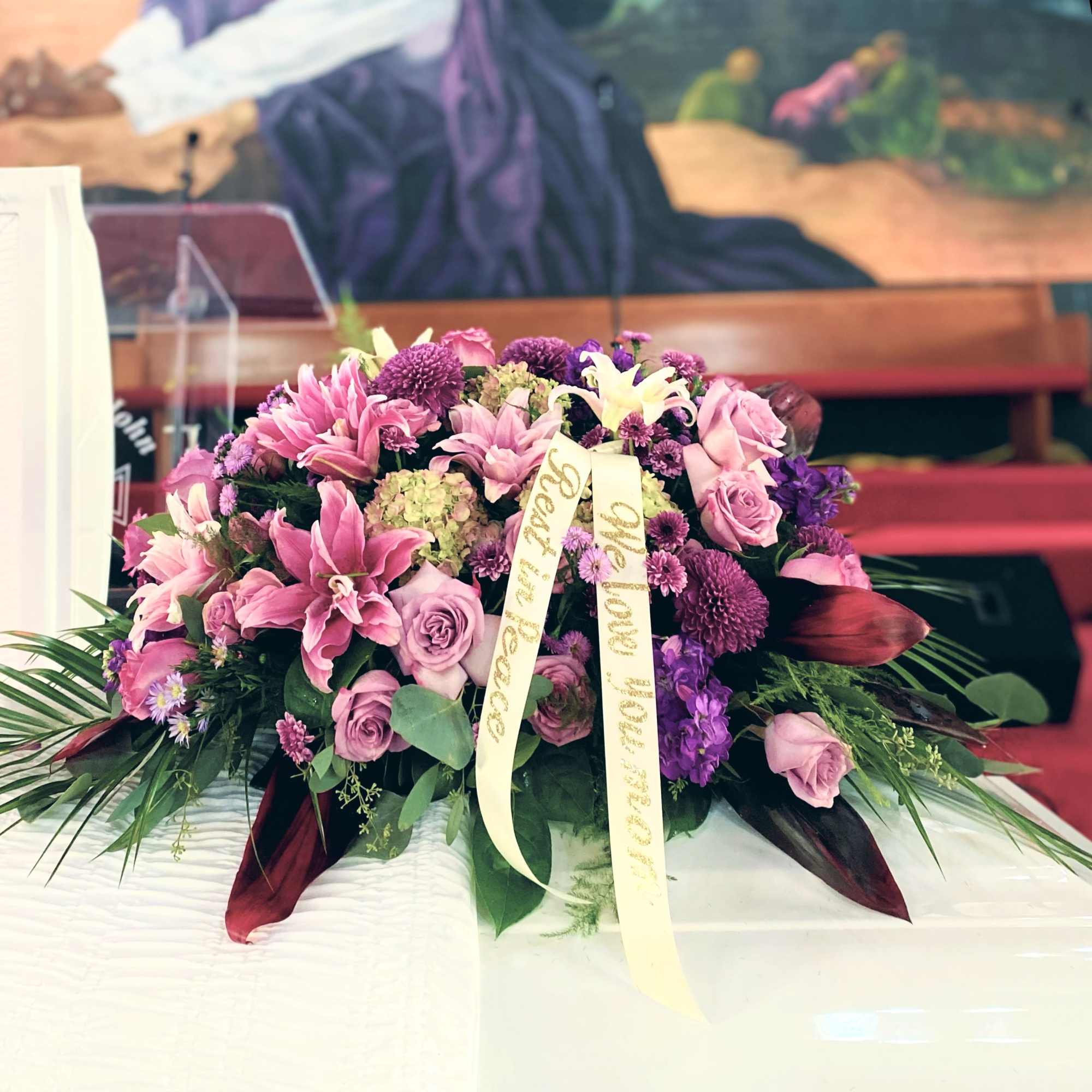 Precious casket spray Is an array of 3 colors . Please pick