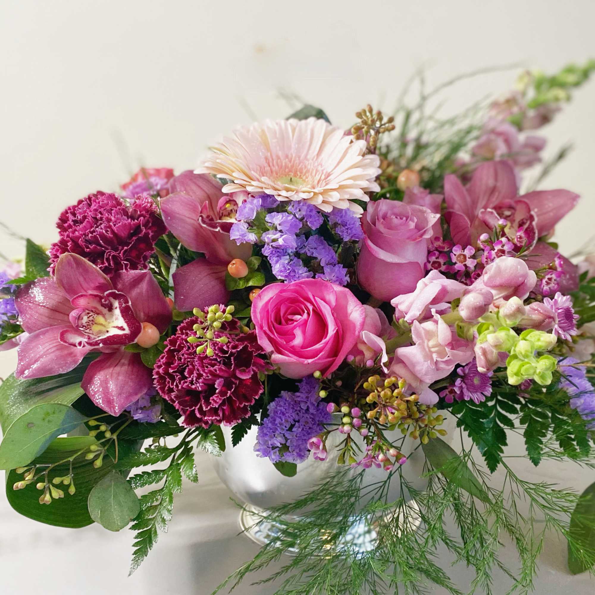 Serene blossoms is lush, botanical, soft and beautiful floral arrangement. Pink lavender