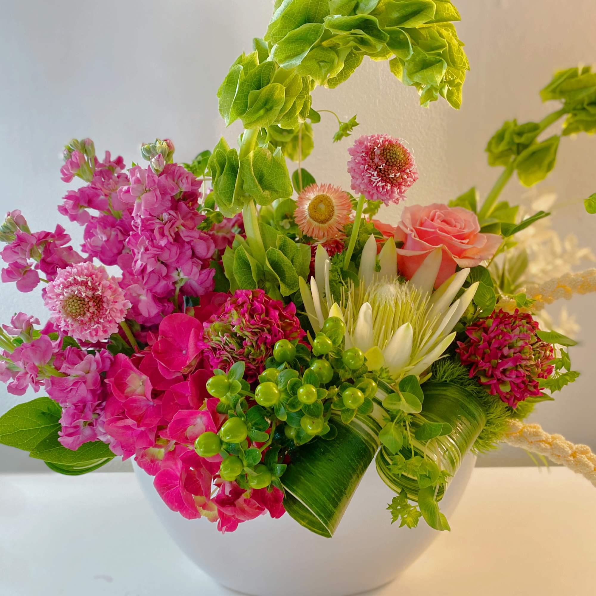 Indulge floral arrangement awaiting your style. This modern marvel in a sleek, photo 2 of 2