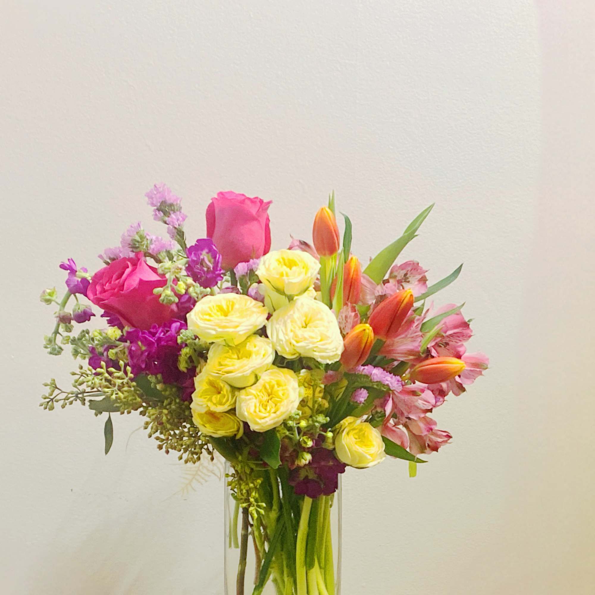  Smile bouquet is a stylized clean and modern ensemble with roses