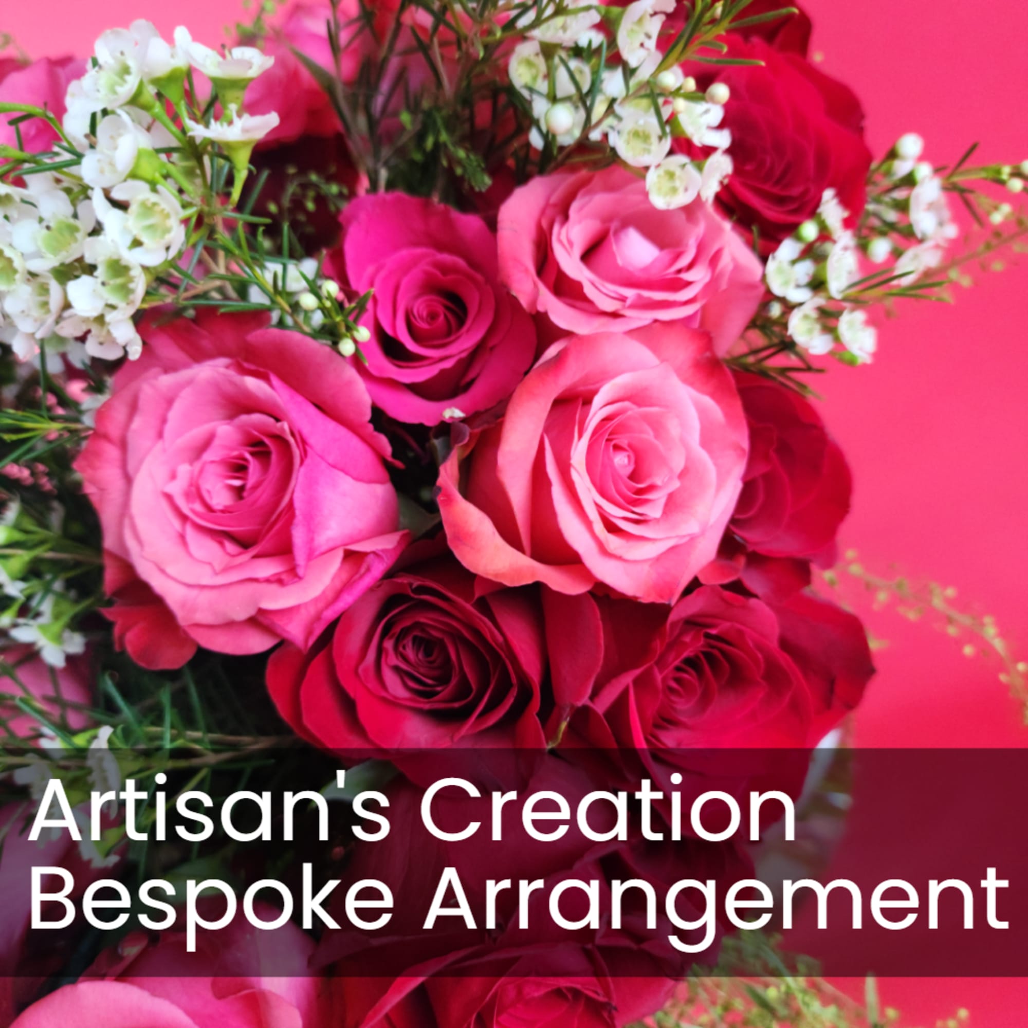 Pink and red roses with small white filler flowers