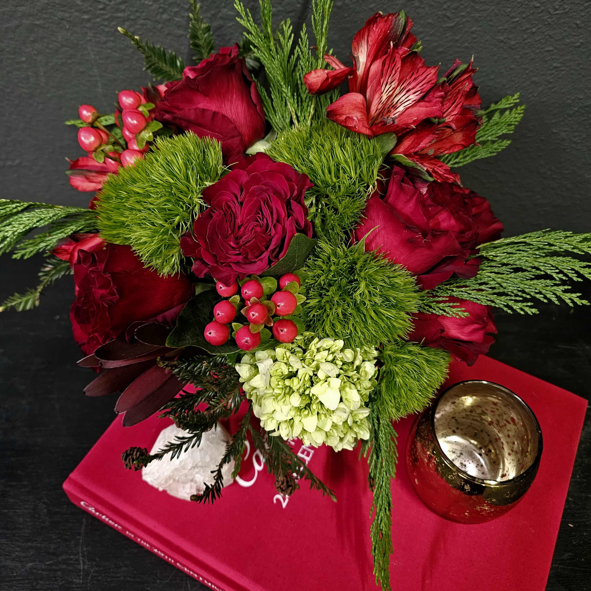 Hypericum berries, fresh seasonal greens, red heart roses, alstoemeria, kermit hydrangea. That's, photo 2 of 2
