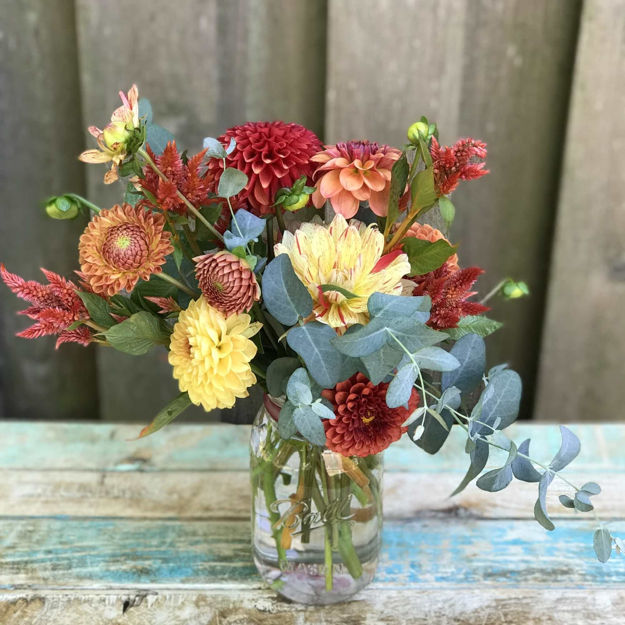 A touch of seasonal colors gathered in a garden style mason jar, photo 4 of 4