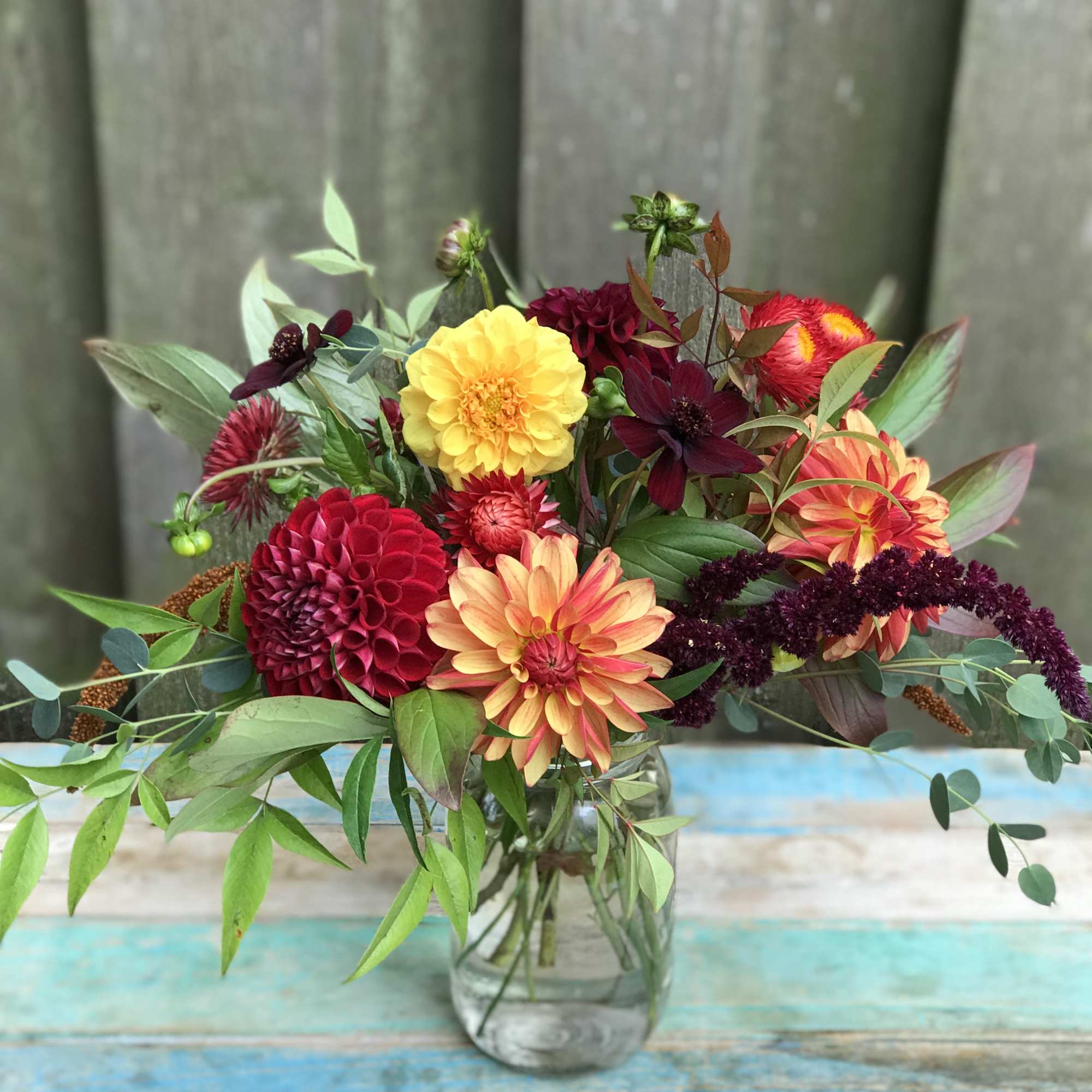 A touch of seasonal colors gathered in a garden style mason jar