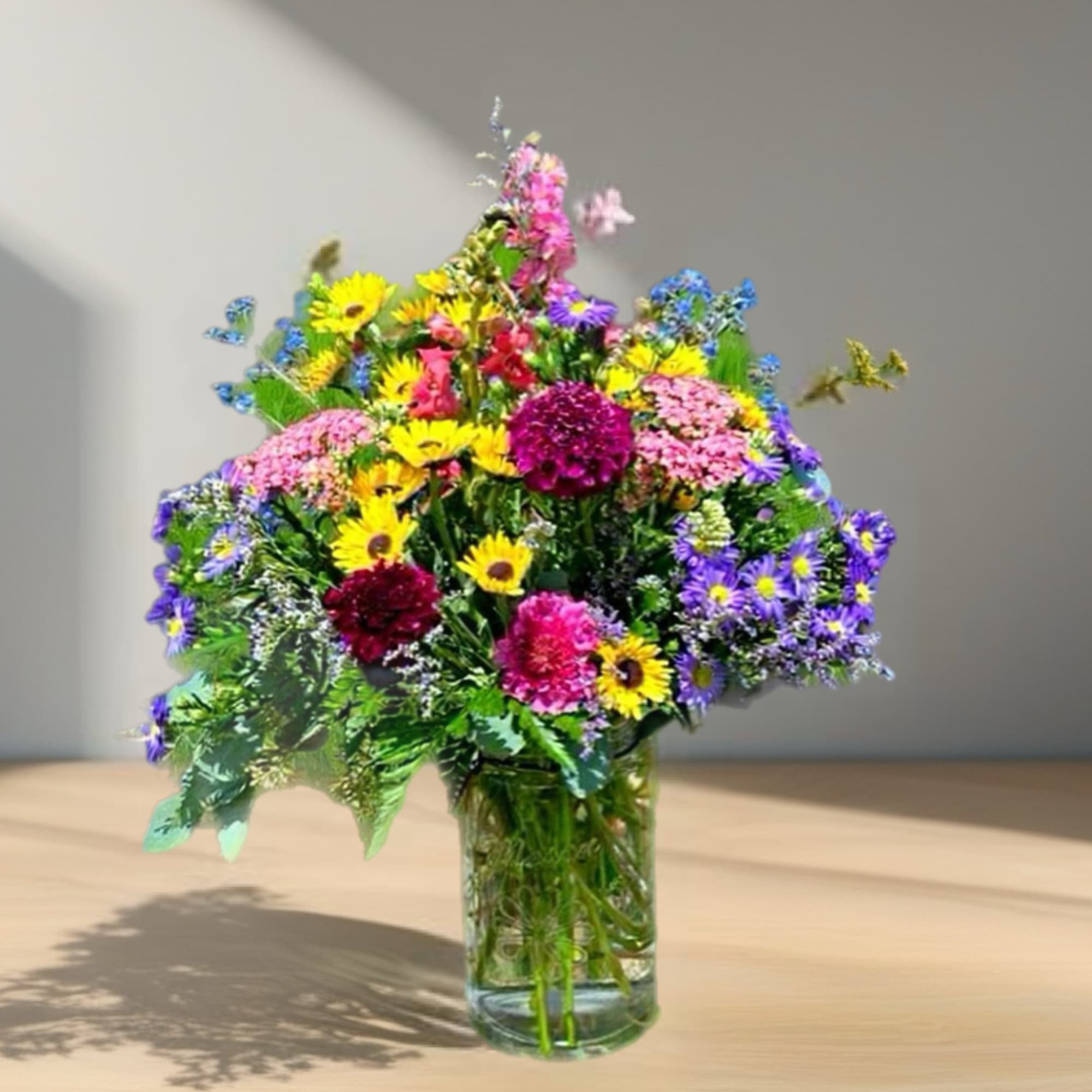 All the wildflowers came to play to make this arrangement pop in