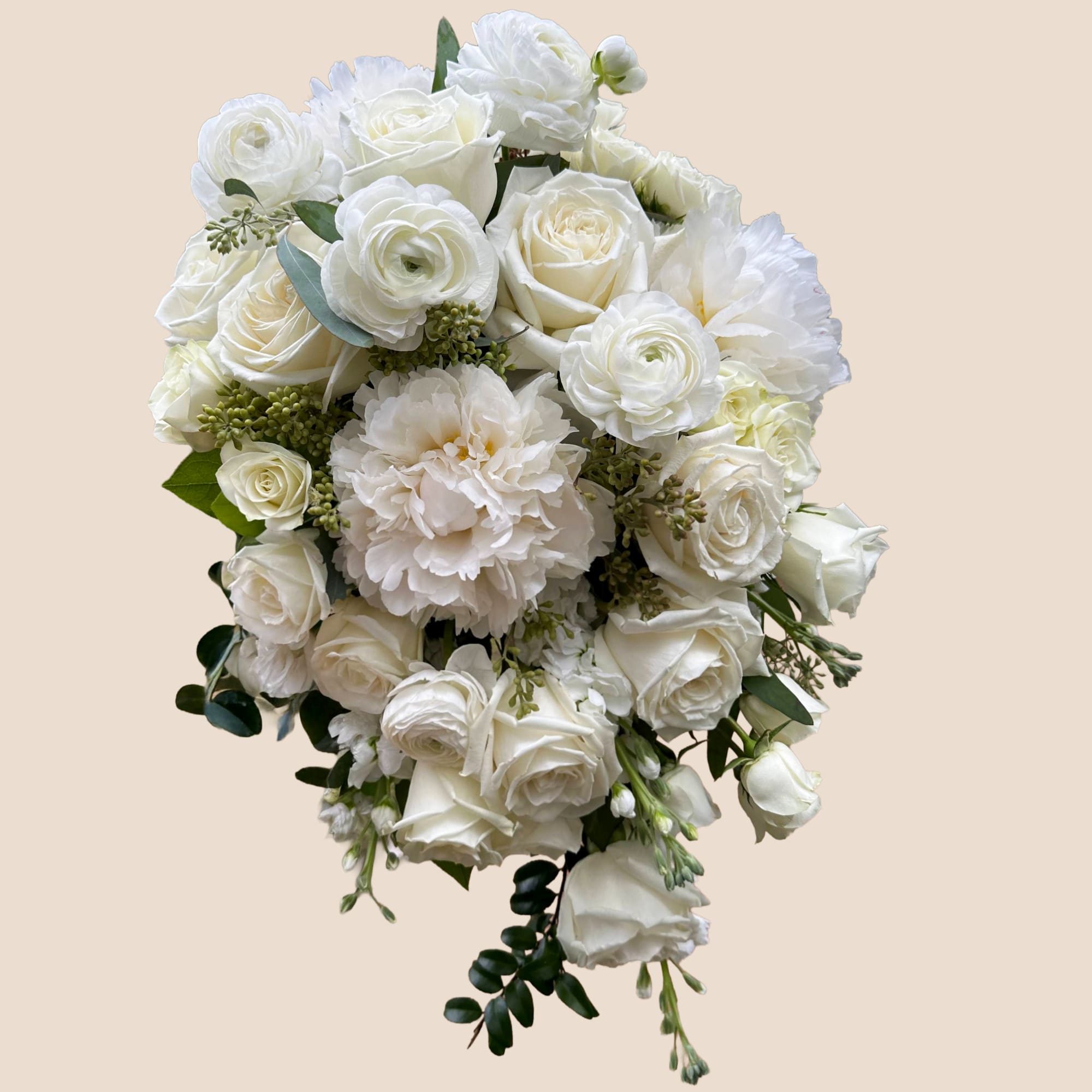 White rose and ranunculus bouquet with soft greenery