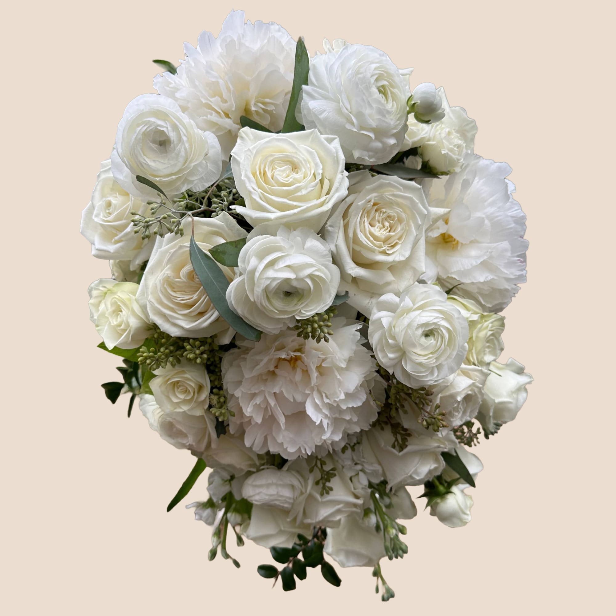 White rose and ranunculus bouquet with peony-like blooms