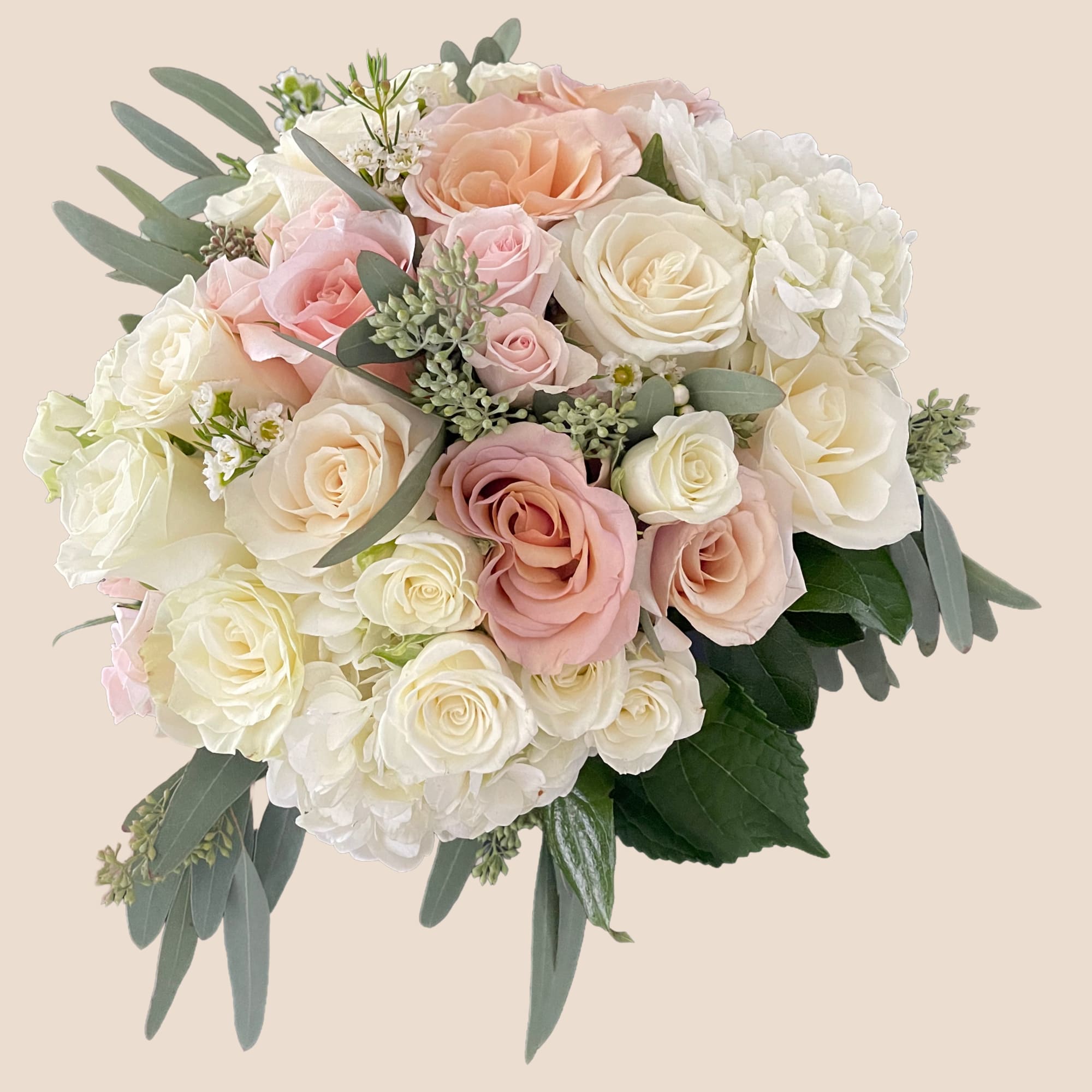 Bouquet of blush and white roses with eucalyptus