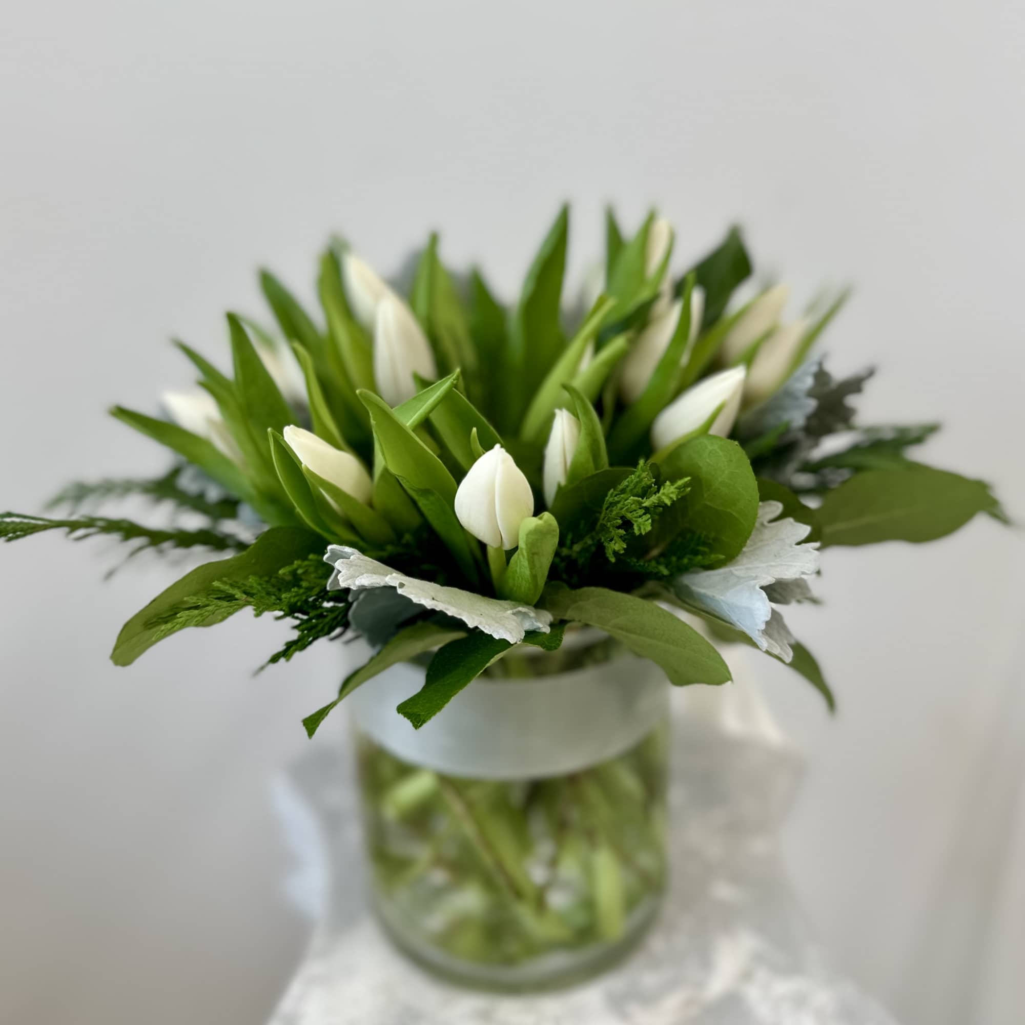 Brighten your day with the enchanting "Spring Whisper" arrangement from Westford Florist