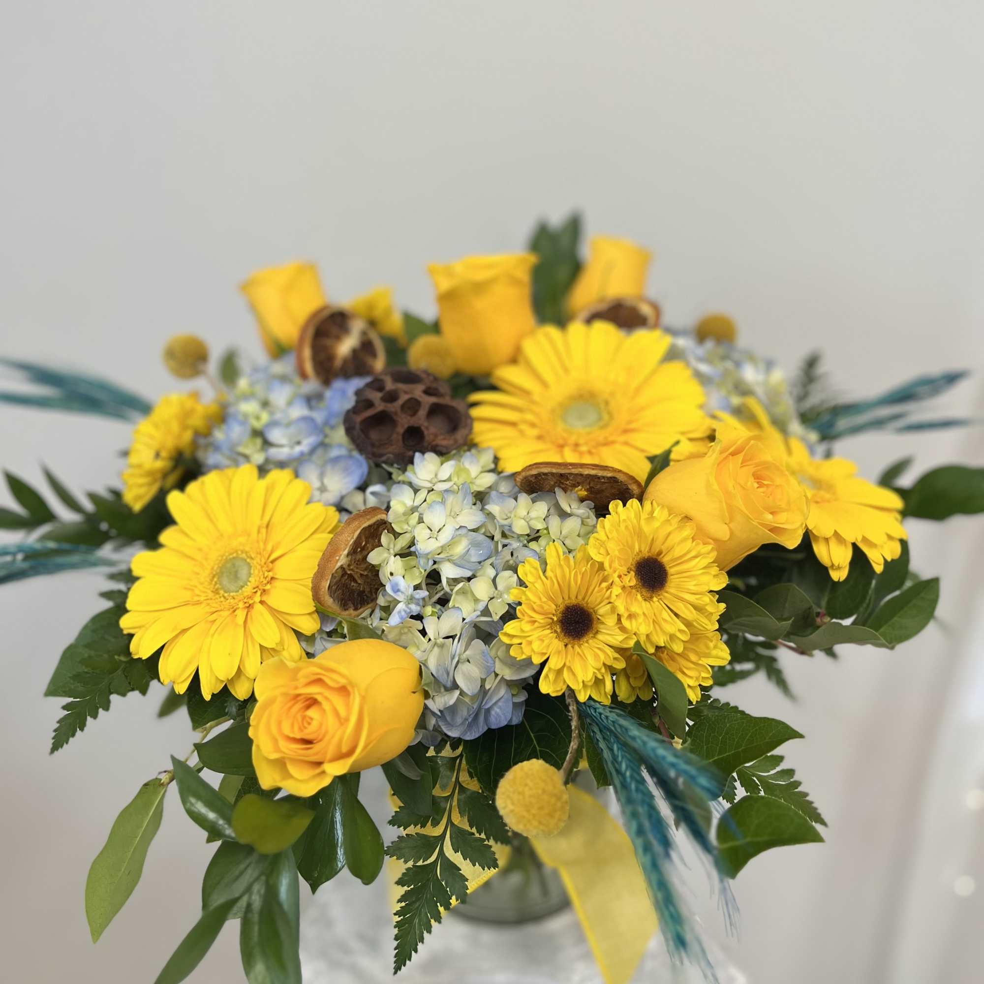 Brighten up any occasion with our beautiful Feeling Happy by Westford Florist