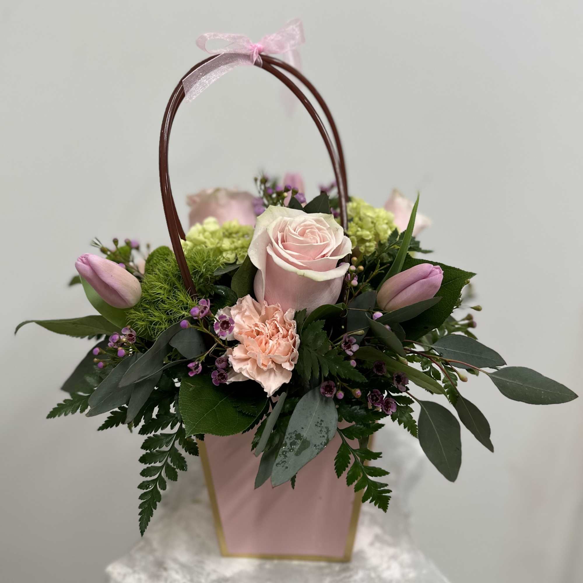Elevate your floral gift-giving with the Blush Lady's Purse by Westford Florist