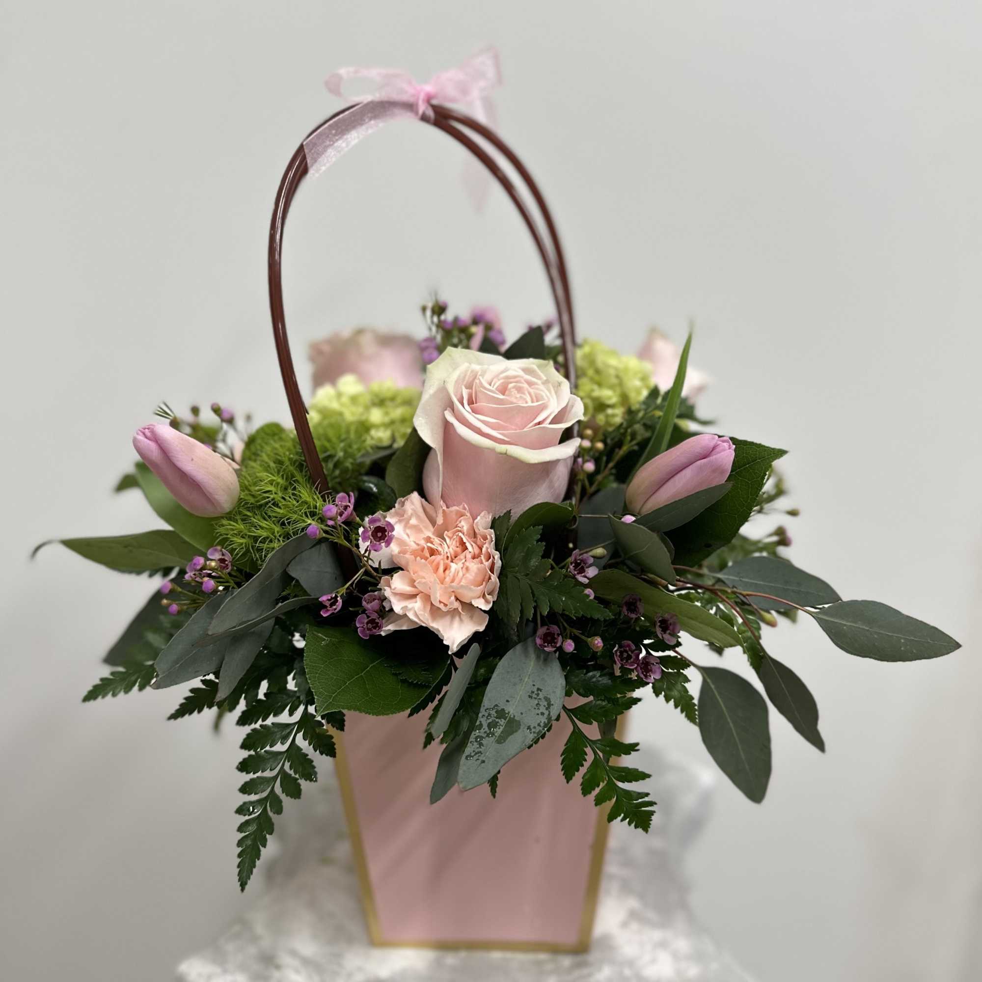 Elevate your floral gift-giving with the Blush Lady's Purse by Westford Florist