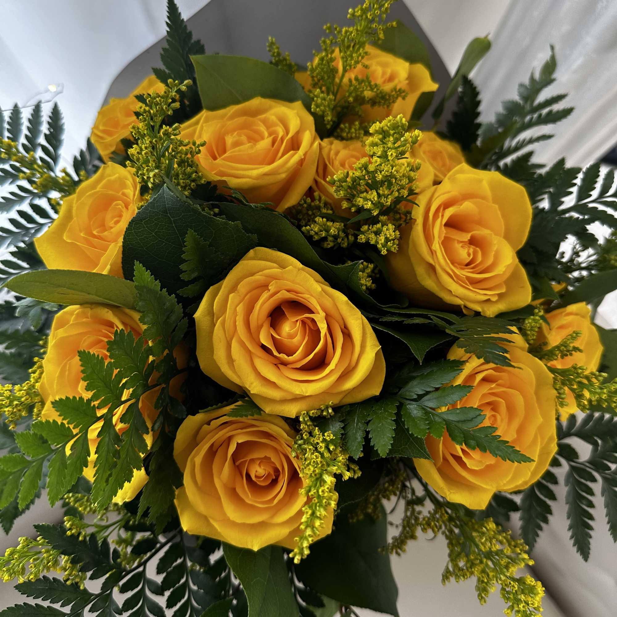 Elevate your gifting experience with the Dozen Yellow Roses Wrapped Bouquet by, photo 2 of 2