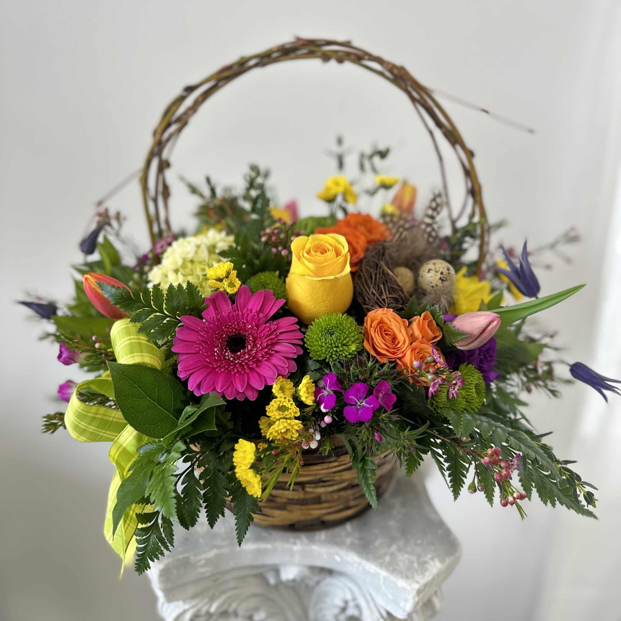 Elevate your Easter celebrations with the exquisite Easter Flower Basket by Westford