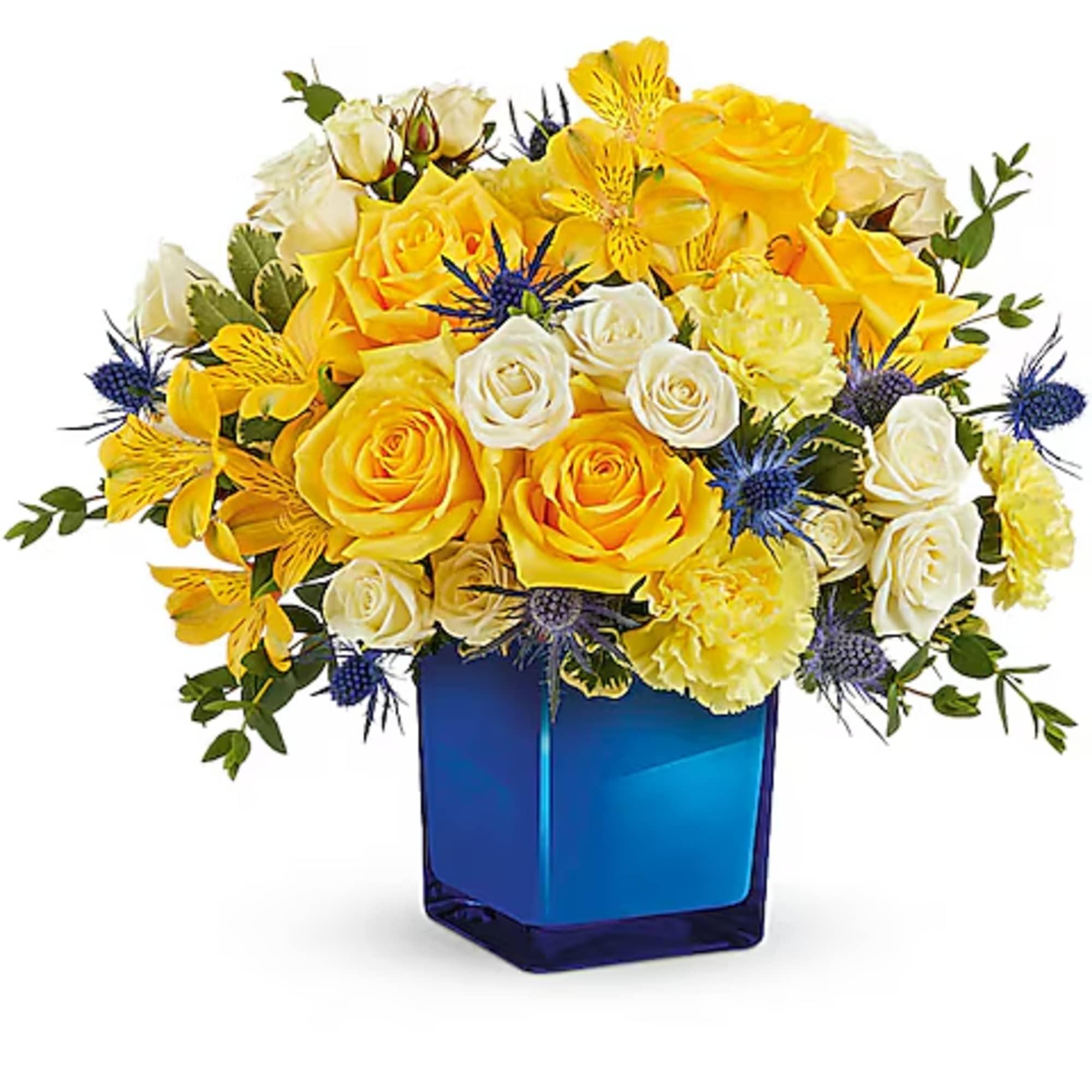 Yellow and white rose bouquet in a blue glass vase