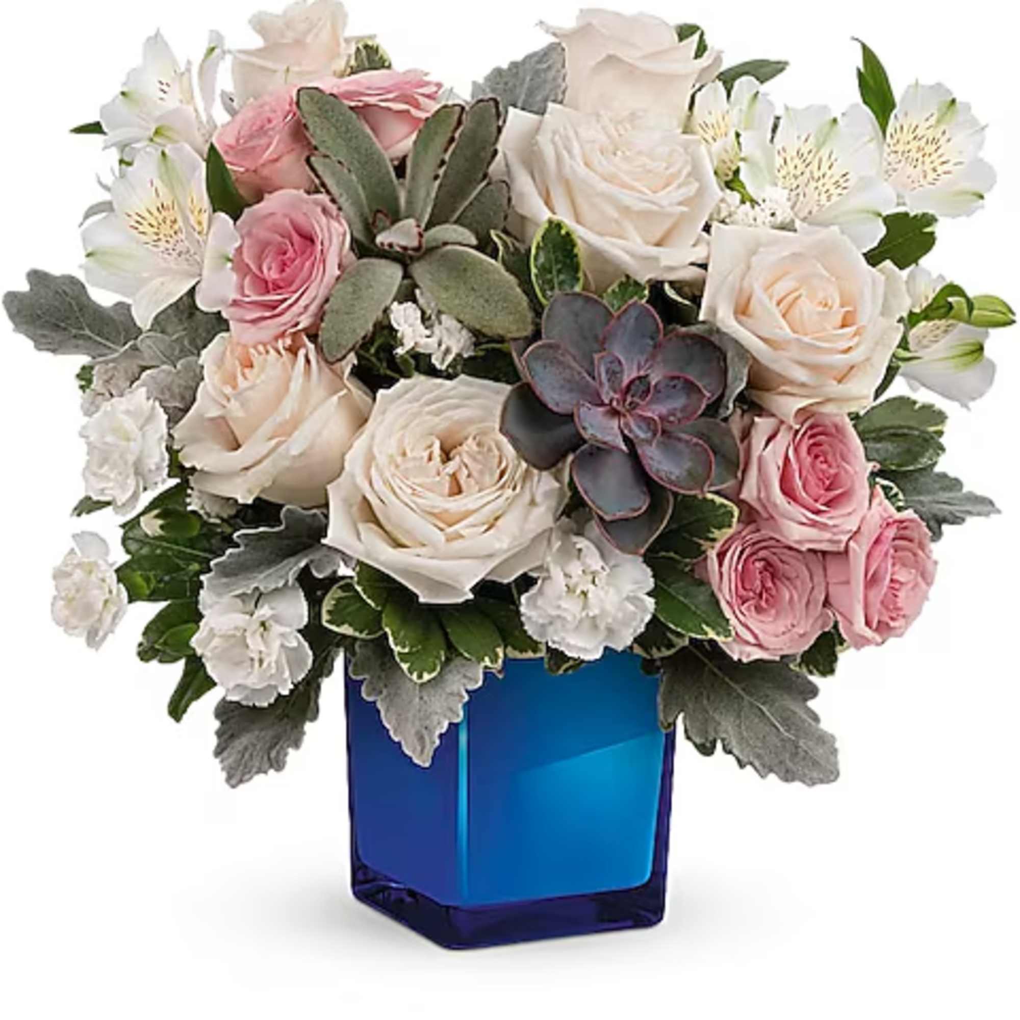 Pink and white roses with white alstroemeria in a blue glass vase