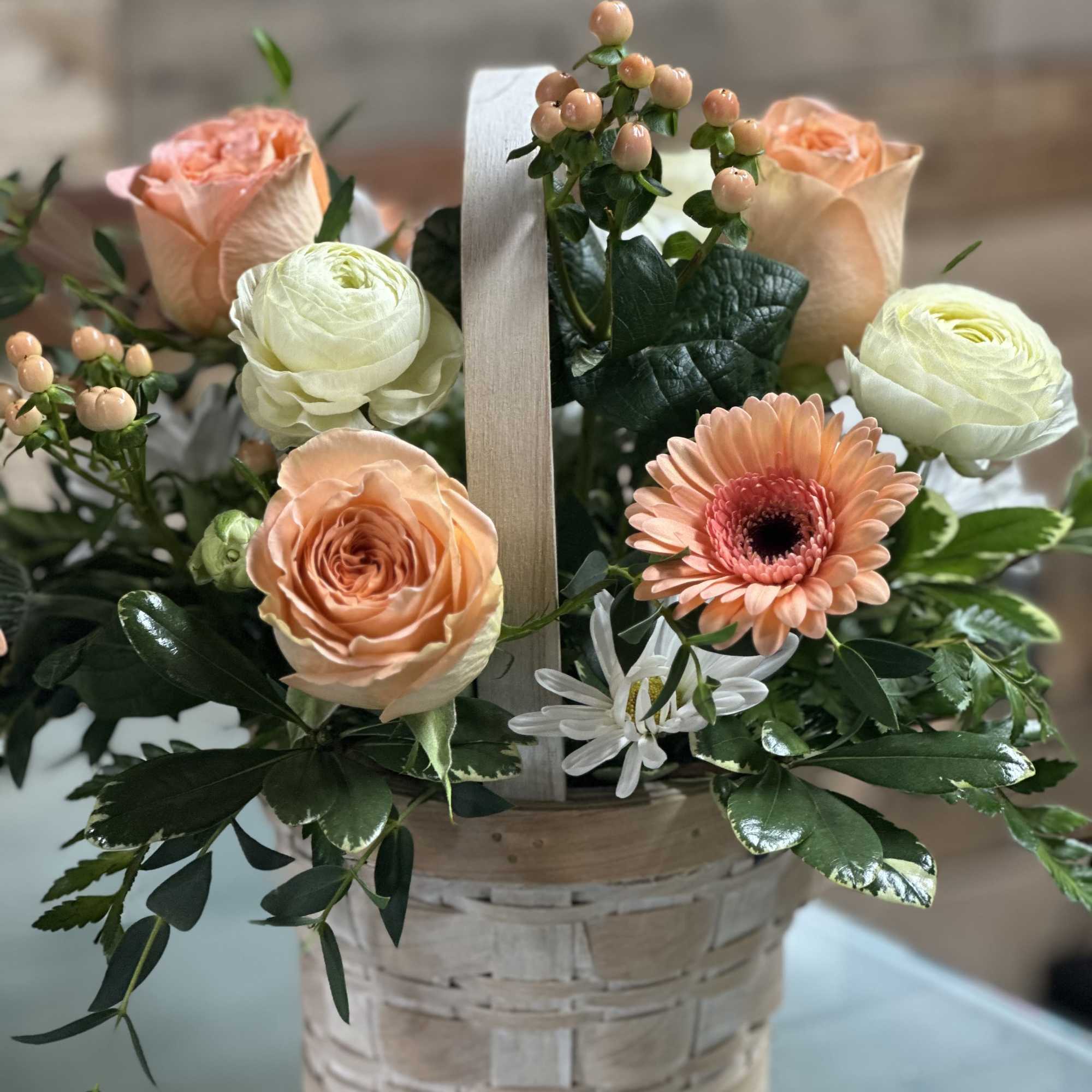 One of our Mother's Day Special feature arrangements...Basket of Blooms is a