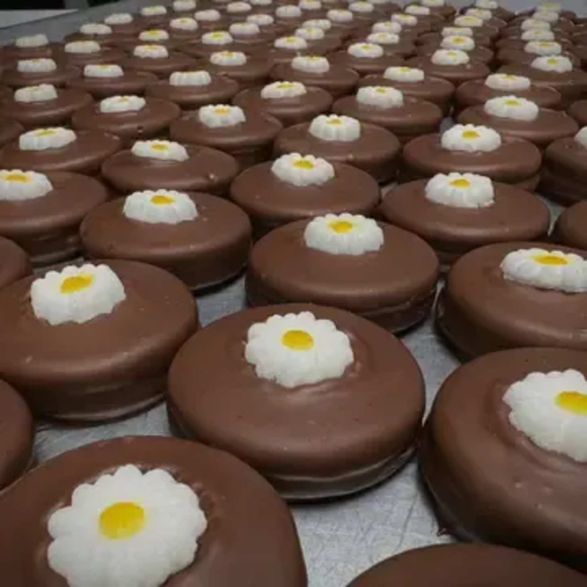 Rows of colorful, chocolate-covered Oreos make a playful alternative to a traditional, photo 2 of 3
