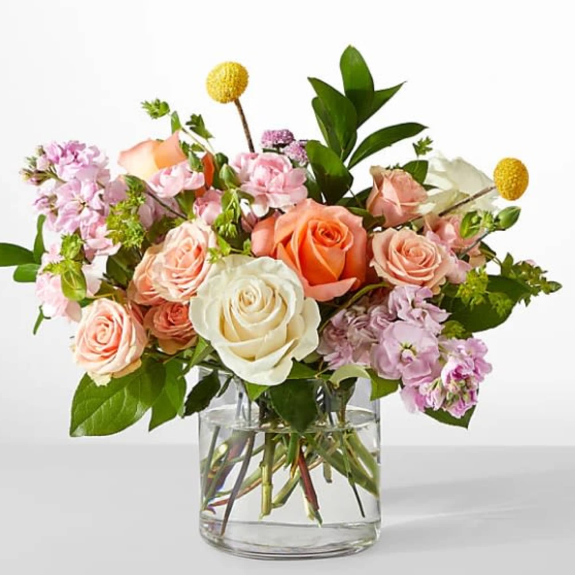 Serene and fragrant, this arrangement blends soft pastels to create a gift