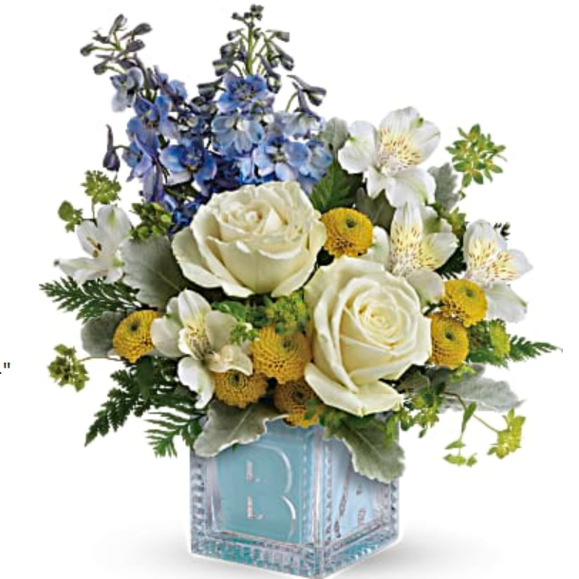 White roses and blue flowers in a blue cube vase