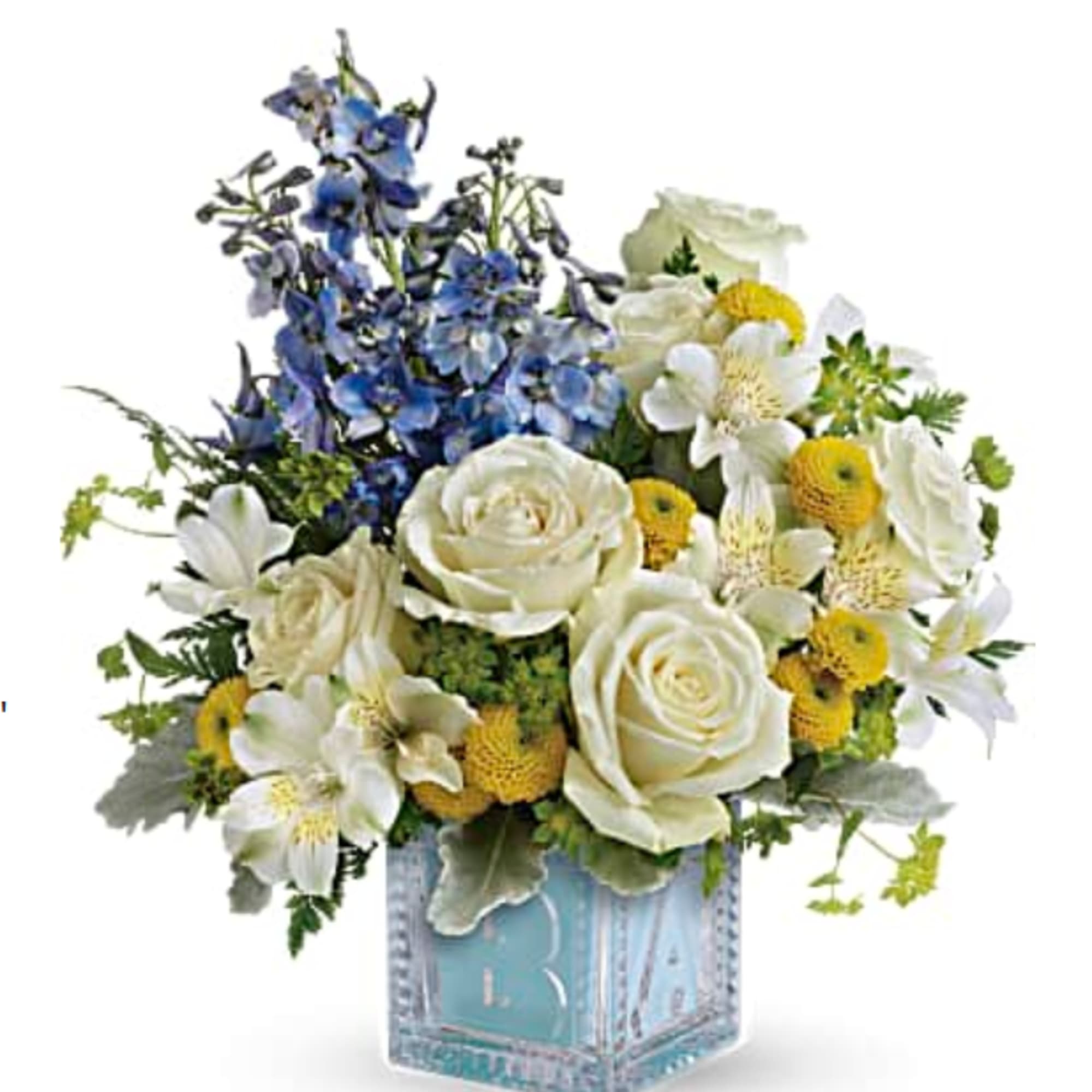 Blue and white floral arrangement in a glass cube vase