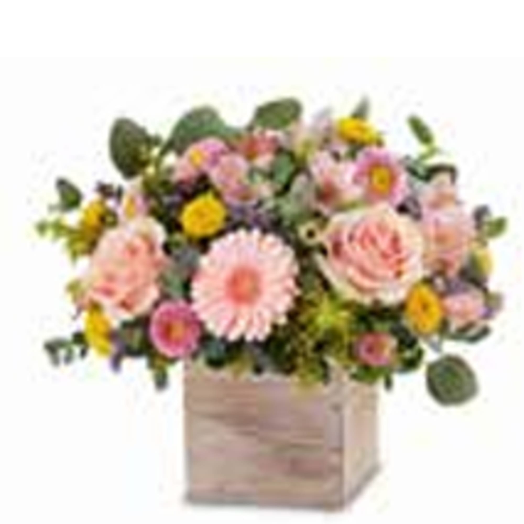 Mixed pink and yellow flowers in a square wooden container