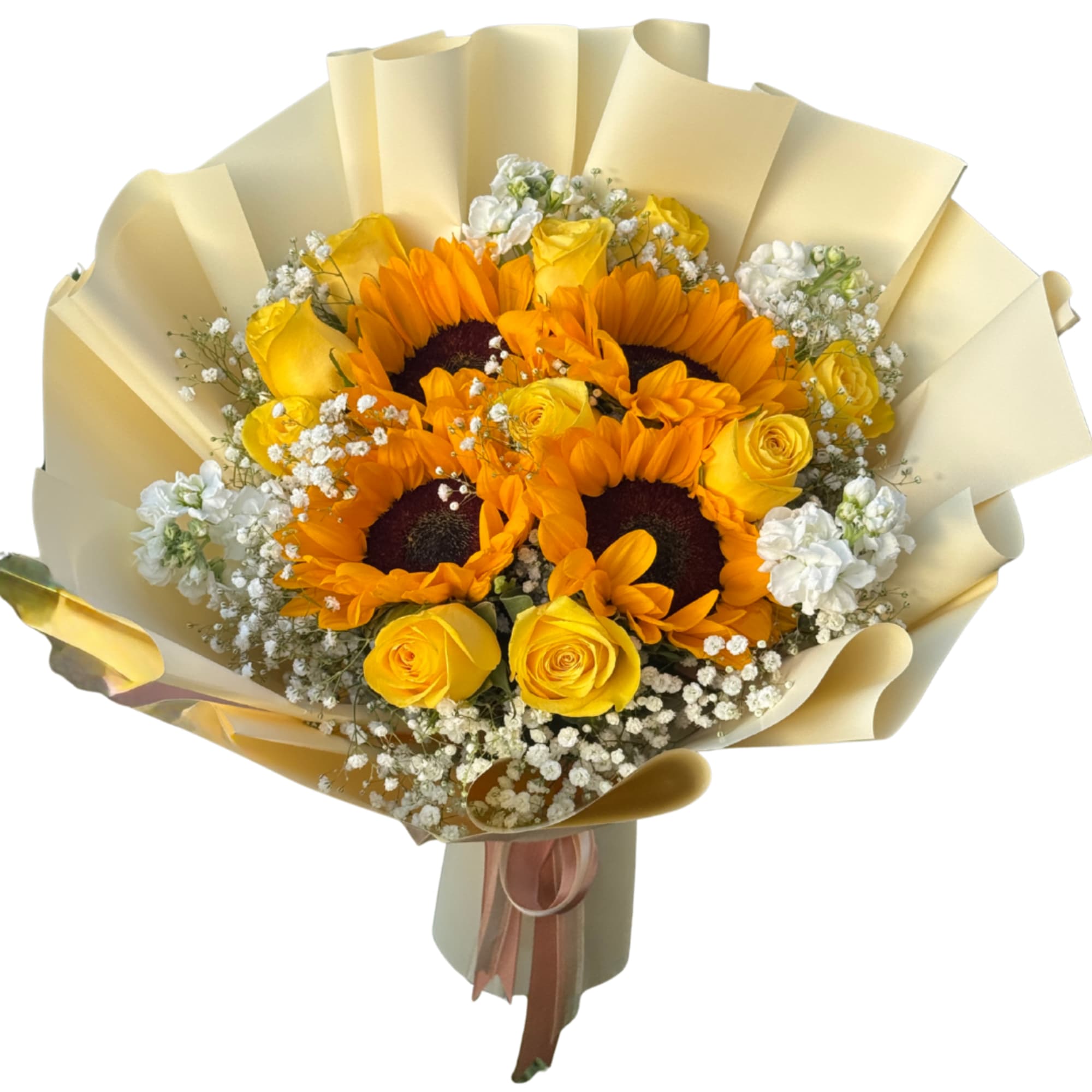 Bouquet of sunflowers, yellow roses, and white filler flowers wrapped in cream paper